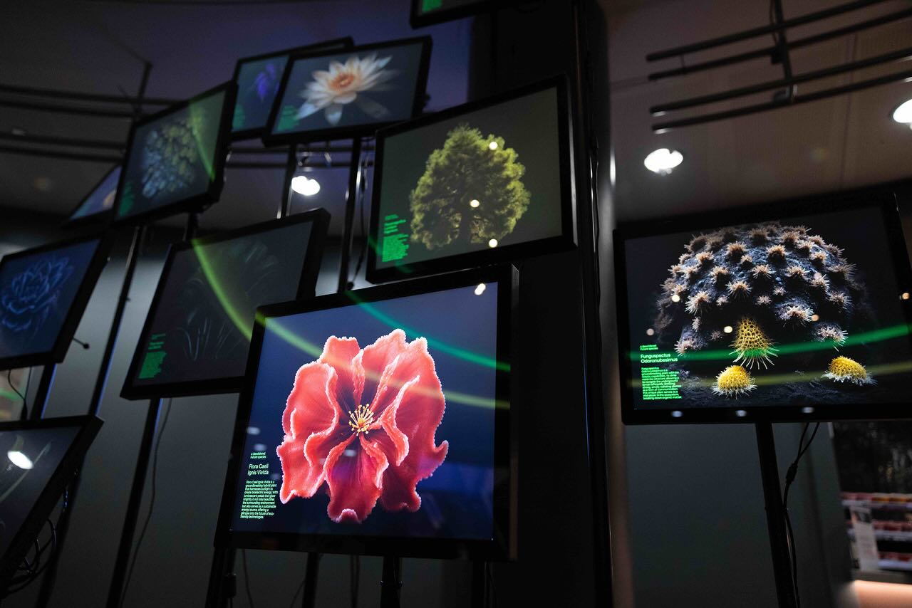 Late last year, we had the opportunity to support an incredible project at the British Film Institute London Film Festival 25, hosted at the iconic IMAX.
Working alongside the team at the @britishfilminstitute (BFI), we helped bring Future Botanica to life, an immersive experience created by artist Marcel van Brakel and the team at Polymorf.
At its core, Future Botanica is a virtual ecosystem, a speculative, co-created vision of nature shaped through augmented reality and collective imagination. Visitors were invited to collaborate with AI, planting imagined ecosystems into future landscapes and watching entirely new forms of nature emerge in real time.
This was one of three installations we supported across the festival. For this experience, our contribution centred on designing and delivering a fully custom island display at the heart of the space, complemented by multiple digital installations that showcased the evolving creations throughout. The result was a layered, visually striking environment that encouraged exploration, interaction, and reflection.
Blending visual poetry with ecological thinking, the installation offered a powerful prompt: what could nature become, and how do we shape that future together?
A brilliant collaboration, and a project we’re proud to have been part of.
Credit: BFI / Millie Turner IG: @millieturnercreative
#LondonFilmFestival #BFI #ImmersiveExperience #AugmentedReality #AR