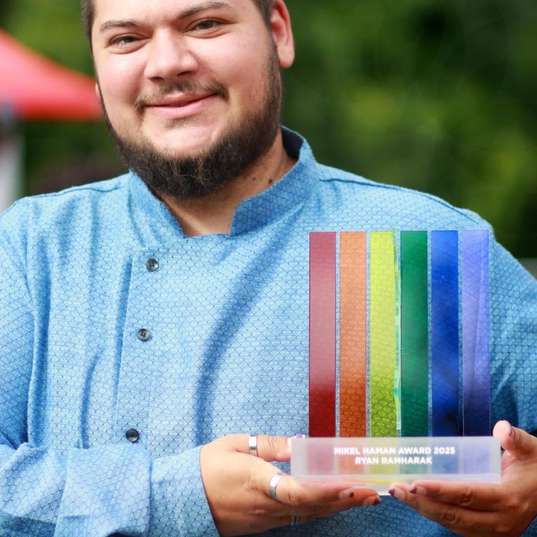 MIKEL HAMAN AWARD 2025
Visual communication and award design for the Mikel Haman Foundation
The Mikel Haman award was founded in 2018 to celebrate Queer People of Color in their contributions to furthering the rights, visibility, and access to resources of the queer communities in the Netherlands at large. In 2025 the award was presented to Ryan Ramharak (they/he) at Roze Kwaku on July 20th in Nelson Mandel park in Amsterdam Zuidoost. The other nominees were Libya Wachter and Nellie Bakboord.
Ramharak is a trans non-binary Dutch-Hindustani Diversity and Inclusion Officer at a major university and is most well known for their work as a trans non-binary parent writing a book “Hoe ik baba werd”. They share experiences and insights regarding trans parenthood, breaking taboos and creating space for other LGBTQIA+ people with a desire to have children. Additionally, he founded the Zeepaardjesgroep, a community for trans and non-binary people with a desire to have children, and gives workshops to healthcare professionals on inclusive birth care.
At BUROBRAAK, we strive to create more visibility for queer activists of color with a long record of social activism. The work that they do ripples through both their own communities, and also every layer of society. Queer liberation is the liberation of all people. This year we developed the visual communications including the collateral, and banners for the ceremony.
#emancipatingandempowering #mikelhamanfoundation #mikelhamanaward #awarddesign
#designforsocialimpact