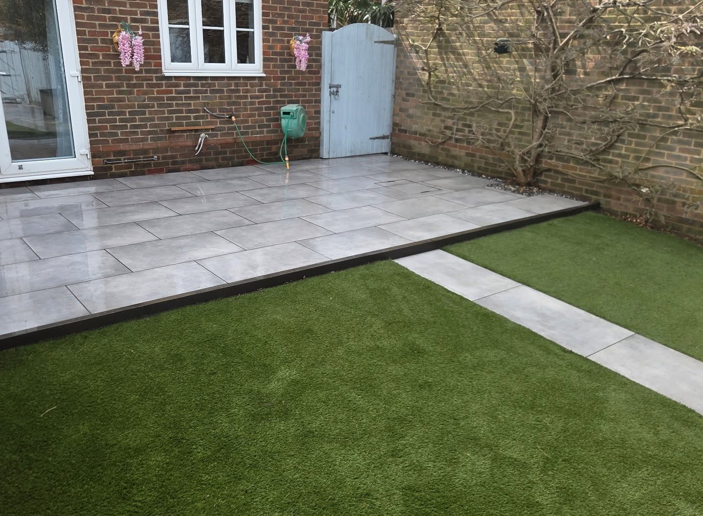 Fresh new look for this garden in Iwade. Venetian grey porcelain, installed for Pat, replacing poorly laid sandstone. Very pleased with the result!