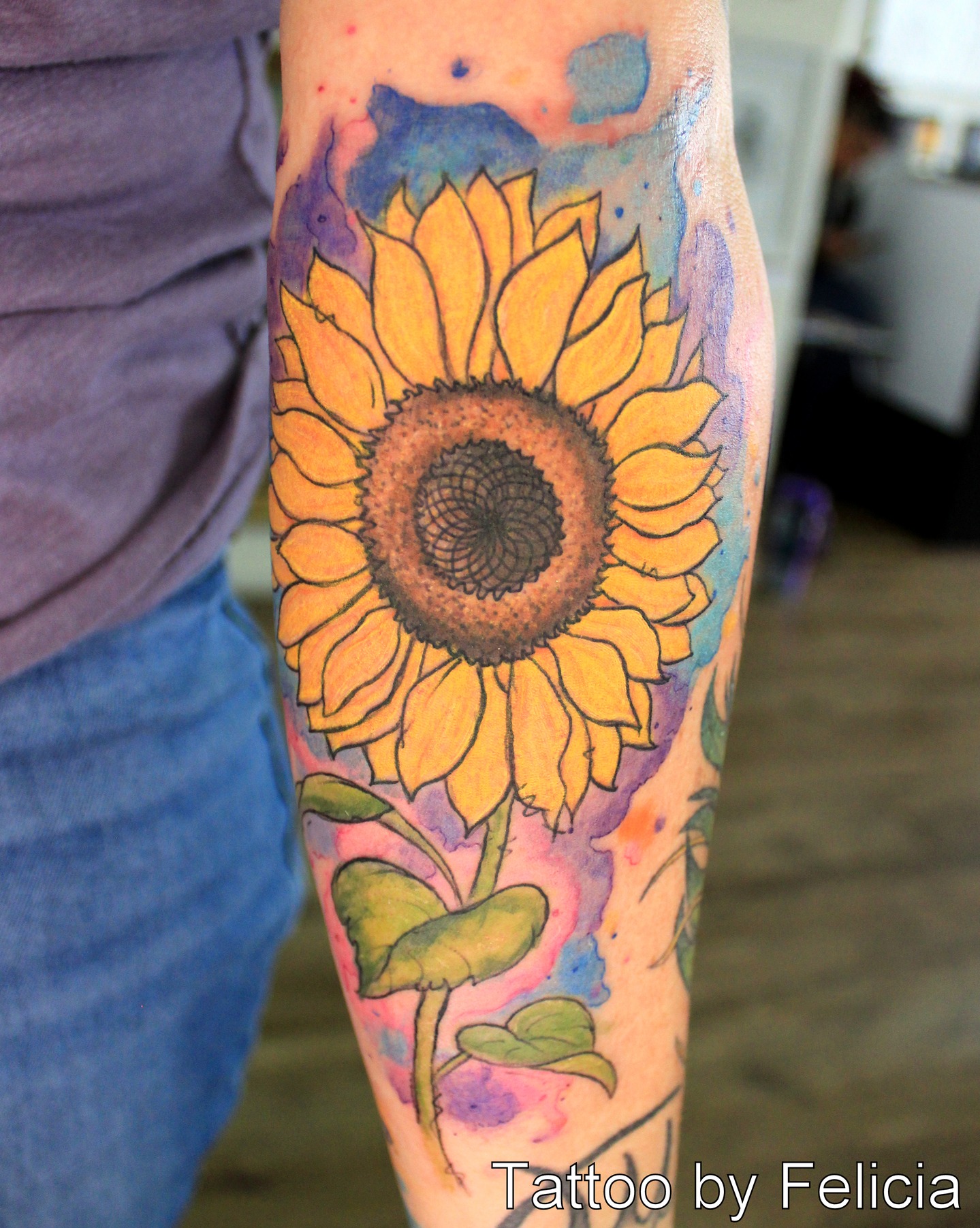 Gorgeous sunflower with super colorful watercolor background! 💜🌻💙 Tattoo by Felicia. @tattoosbyfelicia
#fortmyersbeach #tattoos #sancarlospark #bonita #naples #239 #swfl #southfloridatattooartist #tattooshop #tattooartist #tattoo #ftmyers #swfl #fgcu #tattoosofinstagram #colortattoo