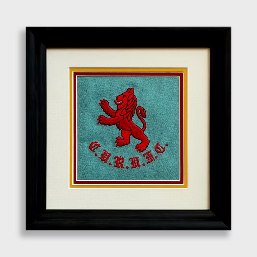 A Cambridge University Rugby Union Football Club badge, framed with the care it deserves. @curufc 🦁
Red rampant lion, turquoise ground, gothic lettering — we triple mounted it with a cream outer, yellow middle and burgundy inner to pull out every colour in the embroidery. Set into a simple black frame so nothing fights for attention.
Got a badge, tie, or bit of club history sat in a drawer? It deserves the wall, not the bottom of a box.
📍 Norwich | Free parking | Open 7 days
☎️ 01603 622282
#norwichframingcentre #bespokeframing #memorabiliaframing #rugby #customframing