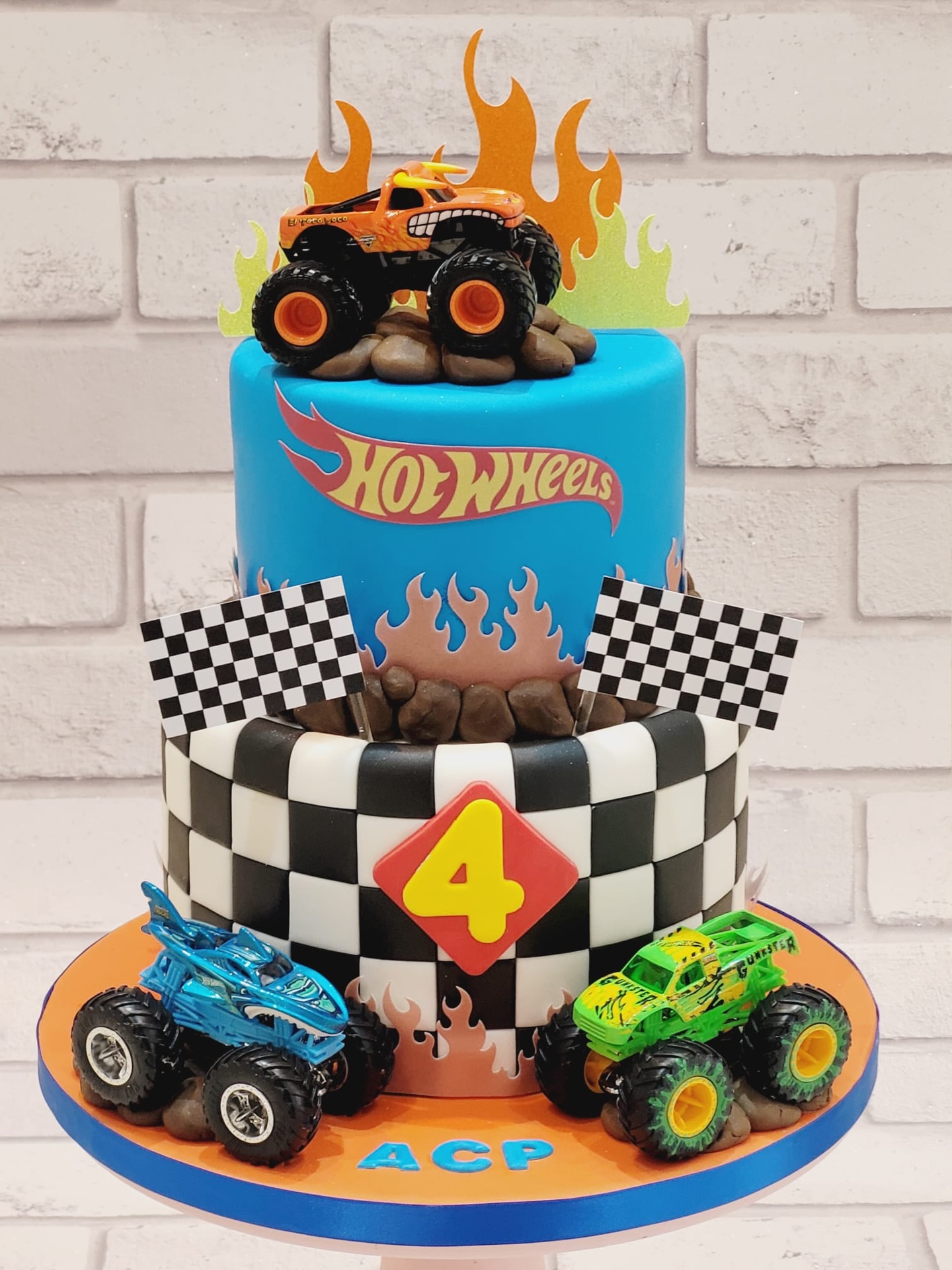 Ready… Set… PARTY! 🔥🏁
This Hot Wheels themed celebration cake is full throttle fun from top to bottom! 🚗💨
With bold flames, racing flags, monster trucks and that iconic logo, this design was all about bringing high-speed energy to a 4th birthday celebration 🎉🔥 The stacked tiers, textured details and vibrant colours really make this one a showstopper!
And those trucks… because one is never enough 😎
Who else would love a cake like this for their little racer? 🏁
#HotWheelsCake #BirthdayCake #KidsCake #CakeDesign #monstertrucks