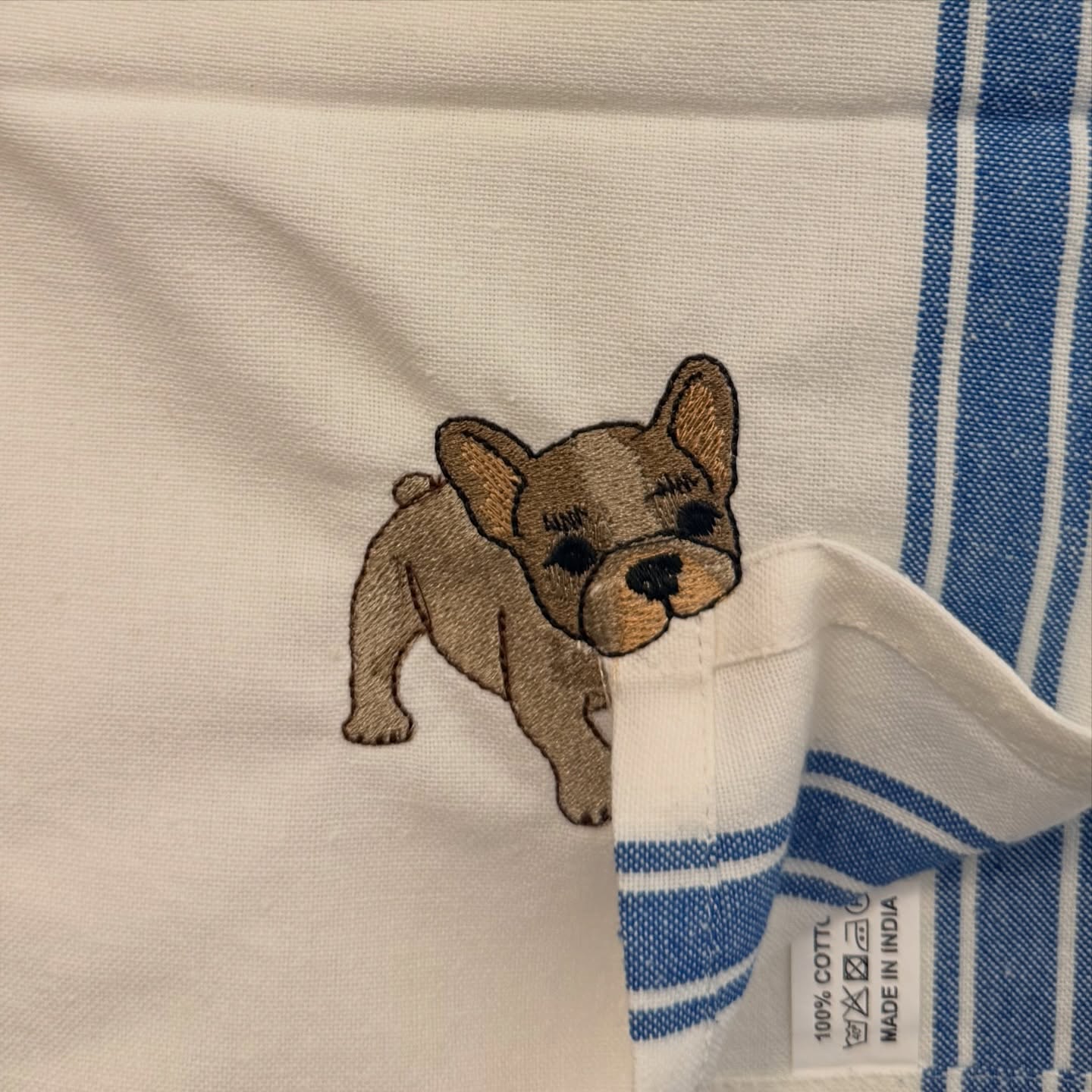 Newest thief……bulldog buddy! #riverfrontdesigncreations #doglovers #dog #embroidery #petlovers