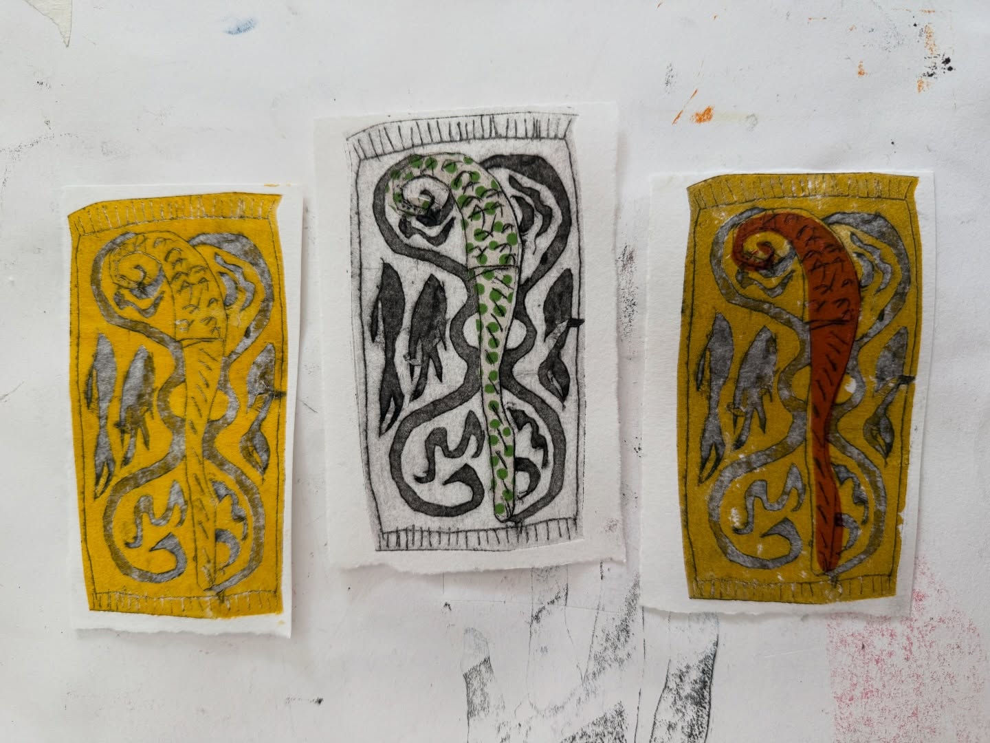 A play date away from home this morning. Using a piece of Recyclo card (pic5)as a plate, always tricky because it’s black! And small, 6x12cm, I made a drypoint of a slipper on the carpet. Or is it a snake? and the flowers became fish!😆some chine colle for definition #printmaking #smalltime #playdate #recycledmaterials♻️ #lifelonglearner
