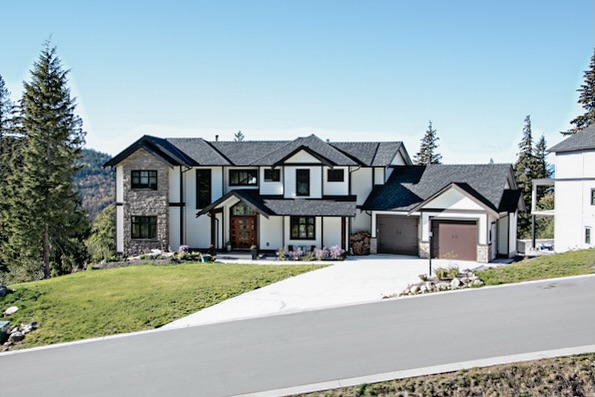A custom home thoughtfully designed for its setting on the hillside of Sumas Mountain. #ironrosehomes