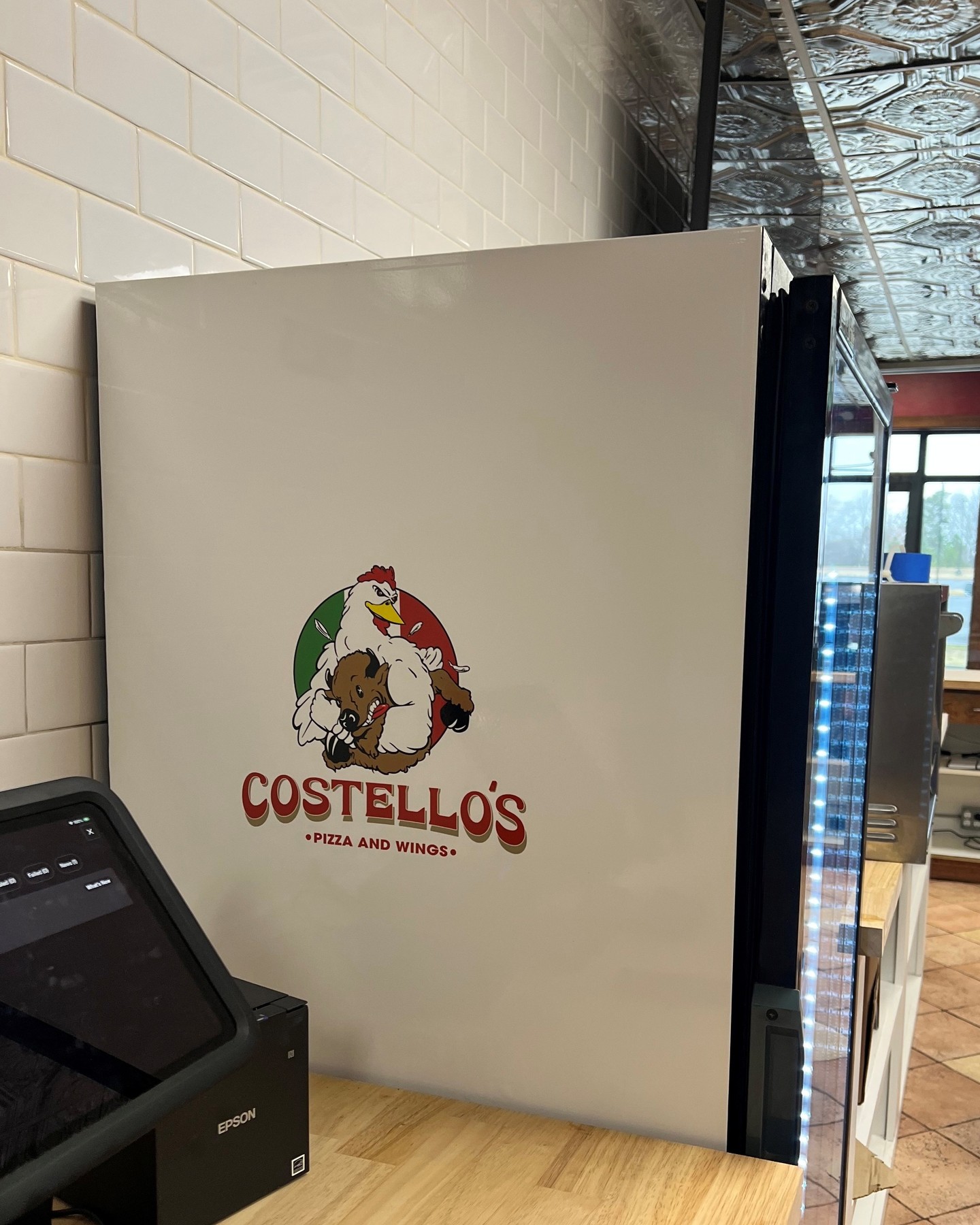 Proof that even the smallest surfaces can serve up a big impact. These custom wraps were printed and installed for Costello's new location, designed to match the space and bring their brand to life in every detail.
Visit youromega.com or call 609-645-1940 to get started on your next print project!