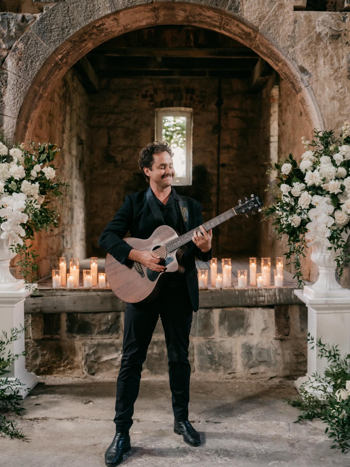 Enjoying the home ground advantage of @provenance_weddings with my favourite helping hand and all around legend @sam.in.the.van and giving @mattfinchcelebrant the lift he deserves. Captured by @weddingswithryal. Playing @fenechguitars Delta Blues.