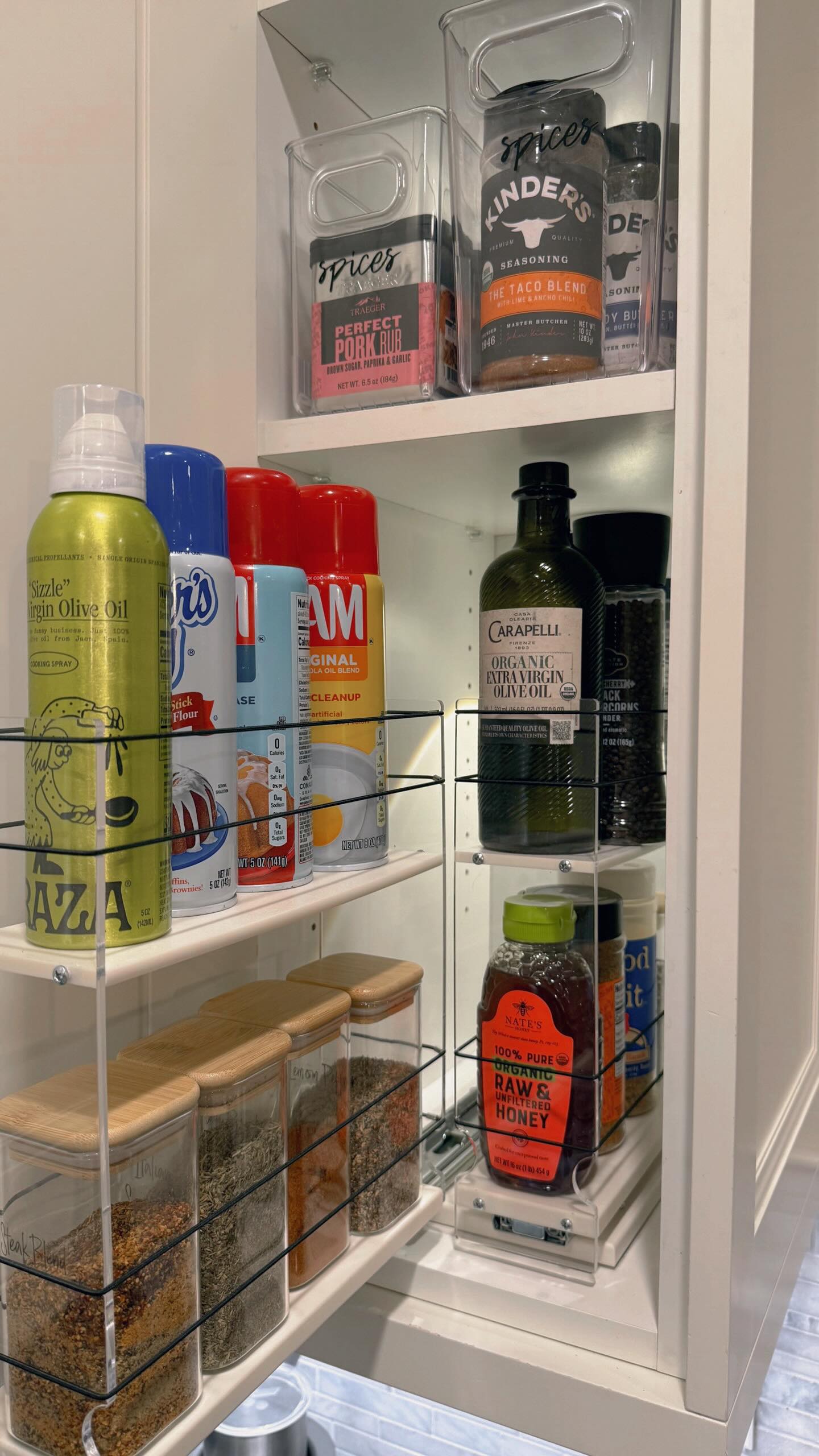 Proof that the right systems change everything. Spice rack and cabinet makeover for a kitchen that feels as good as it looks. #homeorganization #professionalorganizer #kitchenhacks #kitchenorganization #kitchenorganizing
