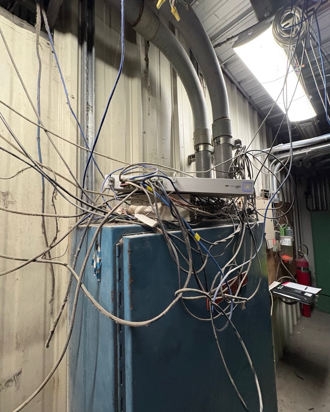 Oh the insanity of IT work. These are some of the lovely situations I surveyed for restructuring today. Let the fun begin. I will come back with some after pics in about a month.