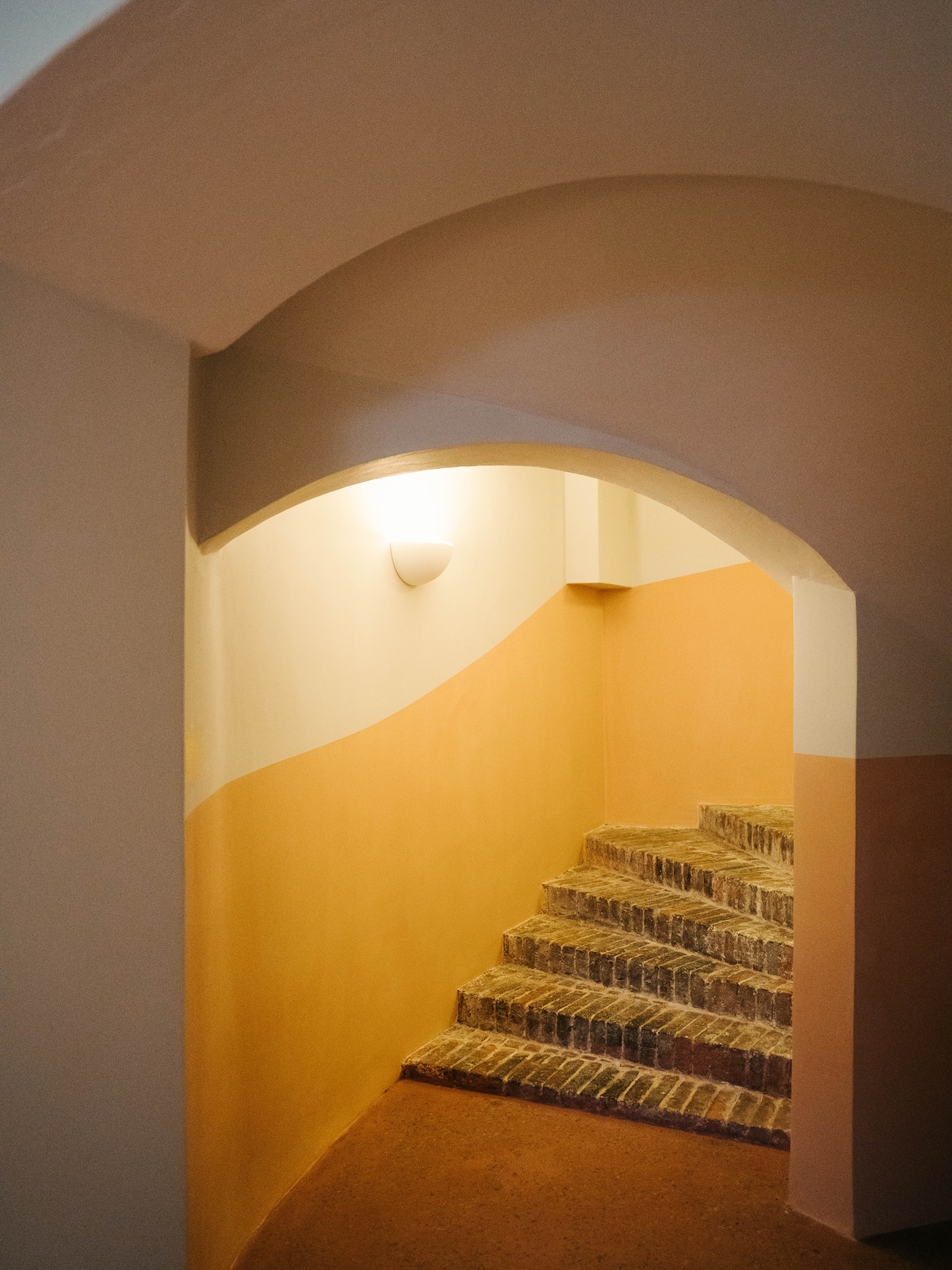 At Lydman’s, the vision has always been to create more than just a shared workspace. Lydman’s Concept, a new joint venture co-owned by MNY and RKL Consulting / @rklindqvist, was born from the idea of creating a venue where historic charm blends seamlessly with design. A place where architecture, aesthetics and function come together, right in the heart of the city.
The Beyond is the latest addition to the concept. With space for up to 40 guests, it’s designed for creative work environments, private events, and unique experiences in an intimate setting.
Original details define the space - roof beams crafted from railroad rails dating back to 1872 and exposed brick arches frame several doorways, complemented with new terracotta-toned clay floors by @luonnonbetoni. The interior is mixture of new and second hand furniture, featuring ash wood tables by @rehnssnickeri and rust-brown Pina lamps by @zafferanolighting, sourced by @plusminuspartners in Helsinki. Fireproof curtains in a wool blend fabric from @nevotex both improve the acoustics of the space and create a room within a room.
FInd more information about Lydman’s Concept at www.lydmansconcept.fi and @lydmans_concept
#architecture #scandinavian #meetingspace #raseborg