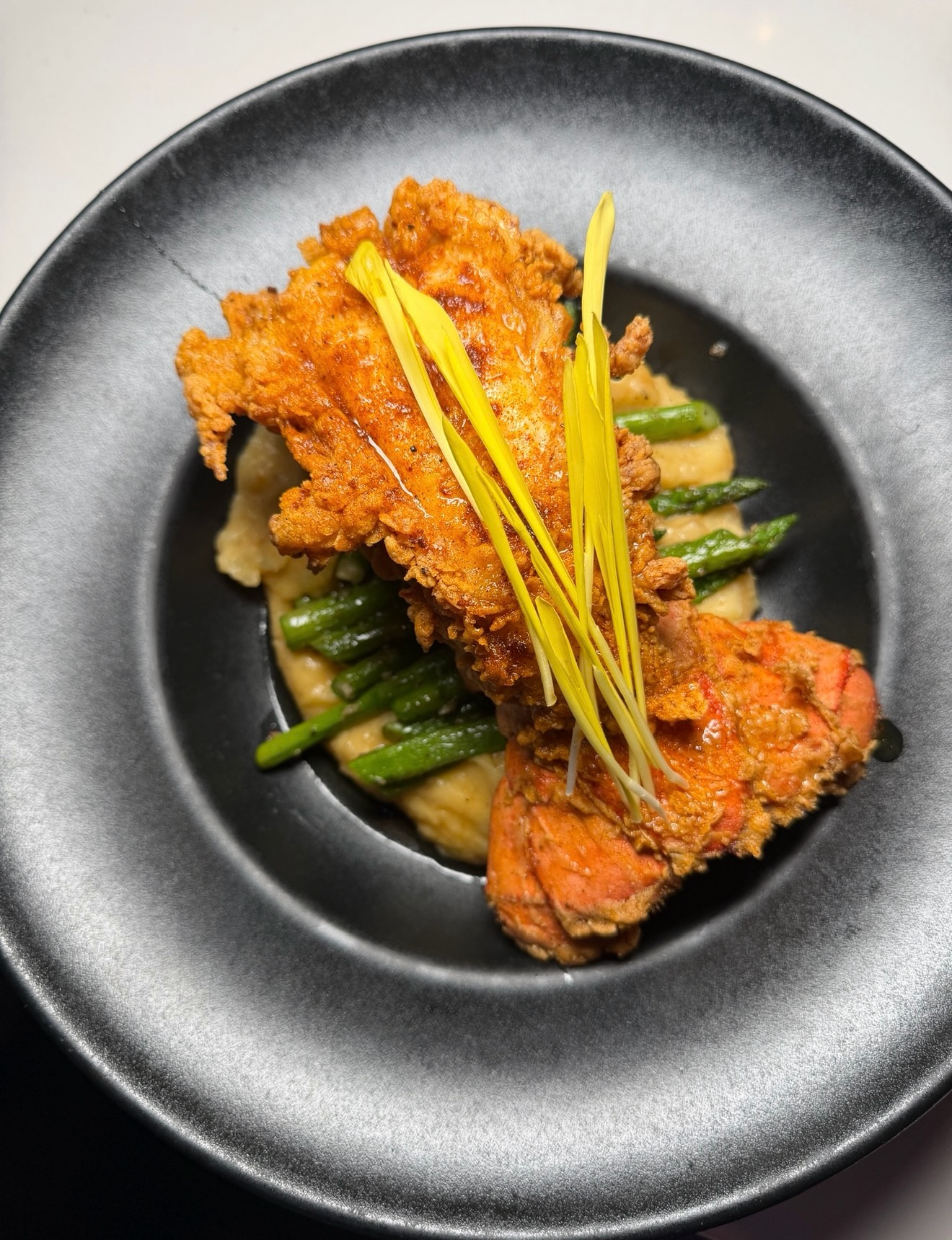 It’s Tuesday, and yes, it absolutely calls for fried lobster mash, crispy, rich, and doing exactly what your day needs, so pull up and treat yourself, doors open at 5.