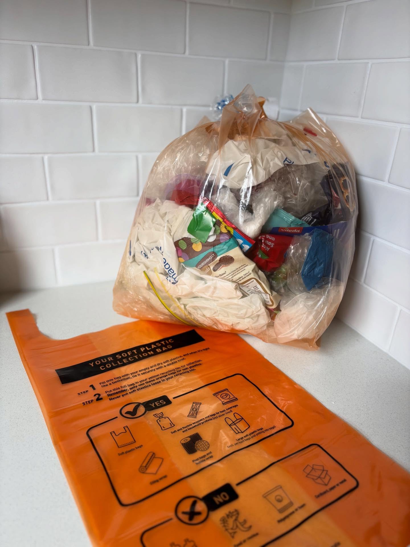 Did you know you can recycle your soft plastics at home?
Simply collect them in an orange recycling bag, and once it’s full, place it straight into your yellow recycling bin - it’s that easy.
Our admin assistant filled this bag in just one week… and that’s from one household of four. Imagine the impact if we all did this. Bread bags, dog biscuit bags, chip packets - it all adds up quickly. Seeing it all in one place is pretty eye-opening.
Orange recycling bags are available to collect from Macedon and Mount Macedon Community House on Monday, Wednesday, and Friday mornings.
Small changes can make a big difference.
Please also drop in your empty toner cartridges, batteries and plastic bottle caps. Bins located in our foyer.
Thank you, MMMCH