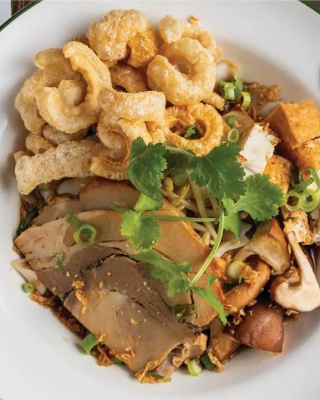 Our signature for a reason! 🍜✨
Bangkok Street Noodles loaded with porchetta pork, crispy crackling and dried shrimp, all brought together in a deep, spiced broth that keeps you coming back.
This is the bowl people return for, every time. Book your table via the link in bio!
#PokPokJunior #AsianStreetFood #ThaiFoodMelbourne #MelbourneCBD #MelbourneLunch