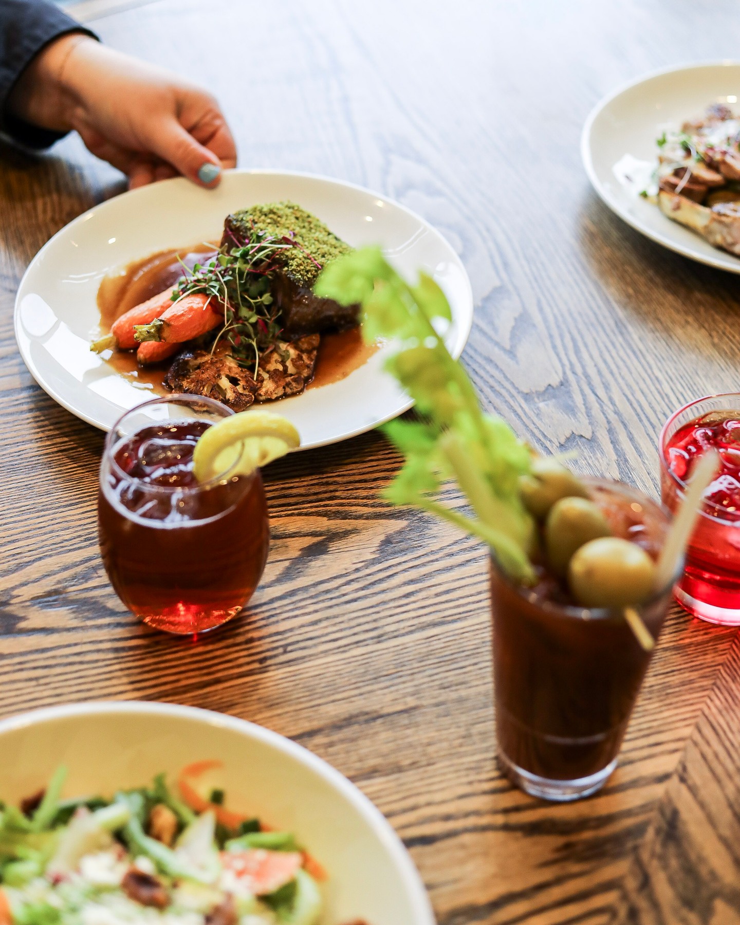 Have you checked out Burdock + Bitters' new menu yet? Their expanded lunch lineup features elevated entrees, from light, refreshing options like their Heirloom Tomato Burrata Salad to hearty favorites such as the Bone In Sakura Pork Chop.
Stop by soon! ➡️ @burdockandbitters