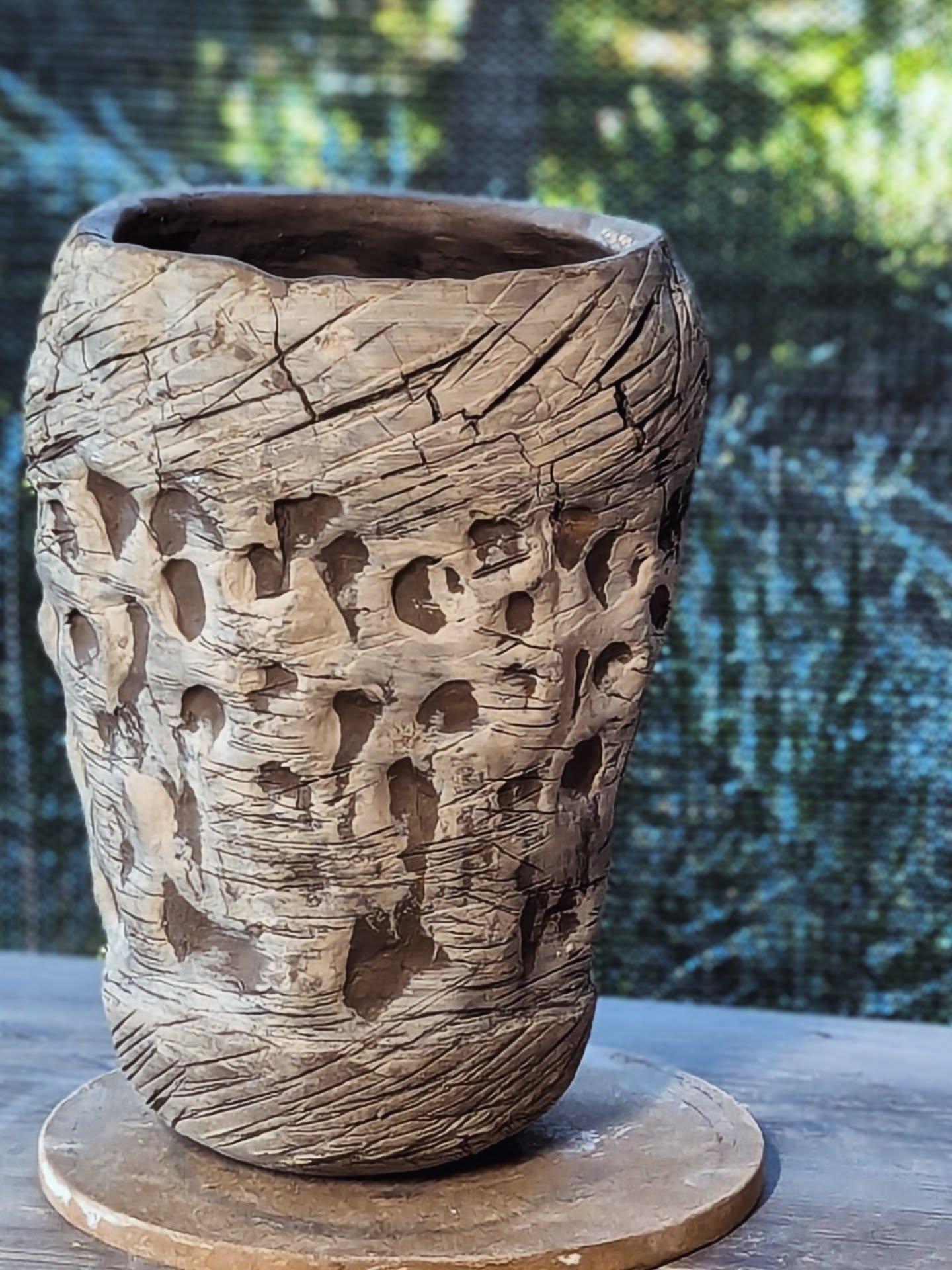 I love working with recycled clay and the unpredictability it brings to the process.
Wheel thrown, torch dried, layered with white slip—then pushed and pulled by hand. A paint scraper through the surface, and sodium silicate opening up deliberate cracks and crevices.
A few hours of studio play, where control gives way to the creative process.
Approx 26cm tall
#recycledclay #ceramics #clayprocess #sustainableart #potterylife