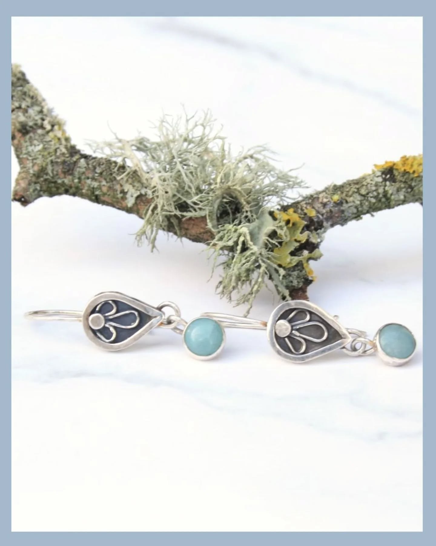 I've been working on a few new styles of earrings over the last couple of weeks.Ā These ones feature a teardrop shaped shadow-box with a little silver flower inside.Ā From the base hangs an amazonite gemstone which can move gently when worn.Ā
Ā
I've always been drawn to this shadow-box style so look out for a few more pieces coming soon.
Ā
These amazonite earrings are available now and please get in touch if you have any questions.