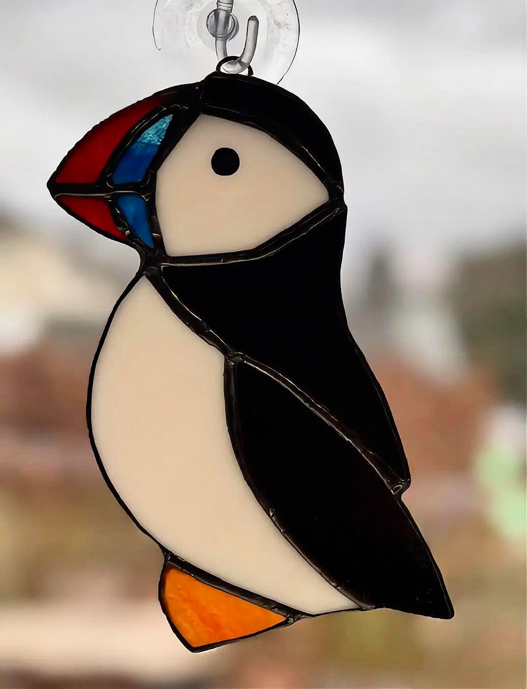 Happy #WorldPuffinDay !!
After visiting the puffin colony on the small island of Lunga off the coast of Scotland a couple of years ago with my son, we both completely fell in love with these quirky little birds! They are so full of character, a little ungainly when attempting to deploy their landing gear and were fascinating to just lie on the grass for hours and watch.
When @rheged approached me about running workshops to coincide with the upcoming summer exhibition ‘The Brilliance of Birds’, I knew we could squeeze a puffin in the event somehow!
And here you go! To celebrate world puffin day, I’m releasing just 25 of my pre-ordered glass puffins, which can be supplied as other a window hanging or in a wooden stand.
Priced at £42 as a hanging, or £46 with the stand. https://www.northlakesstainedglass.co.uk/product-page/puffin-suncatcher
#StainedGlass #Wildlife #Nature #GlassArtist
@thehappyherdwick @visitkeswick @rspb @rspca_cumbria_west @rspb.scotland @rspb @nationaltrust @arts_cumbria @edenvalleyartisticnetwork @artsandcraftsinkeswick @blackwellartsandcrafts