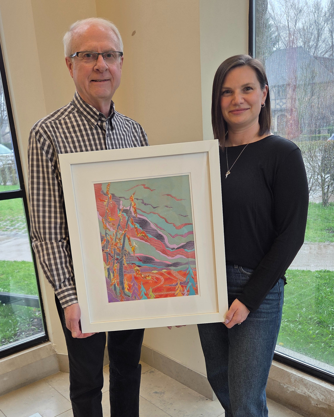 Thanks to everyone who made the 2026 Kingsway-Lambton Charity Art Show & Sale a great success.
Event Coordinator, Robert Yeo, presented door prize winner Kandace Green (right) with the paper mosaic artwork donated by Featured Artist, John Werlich.