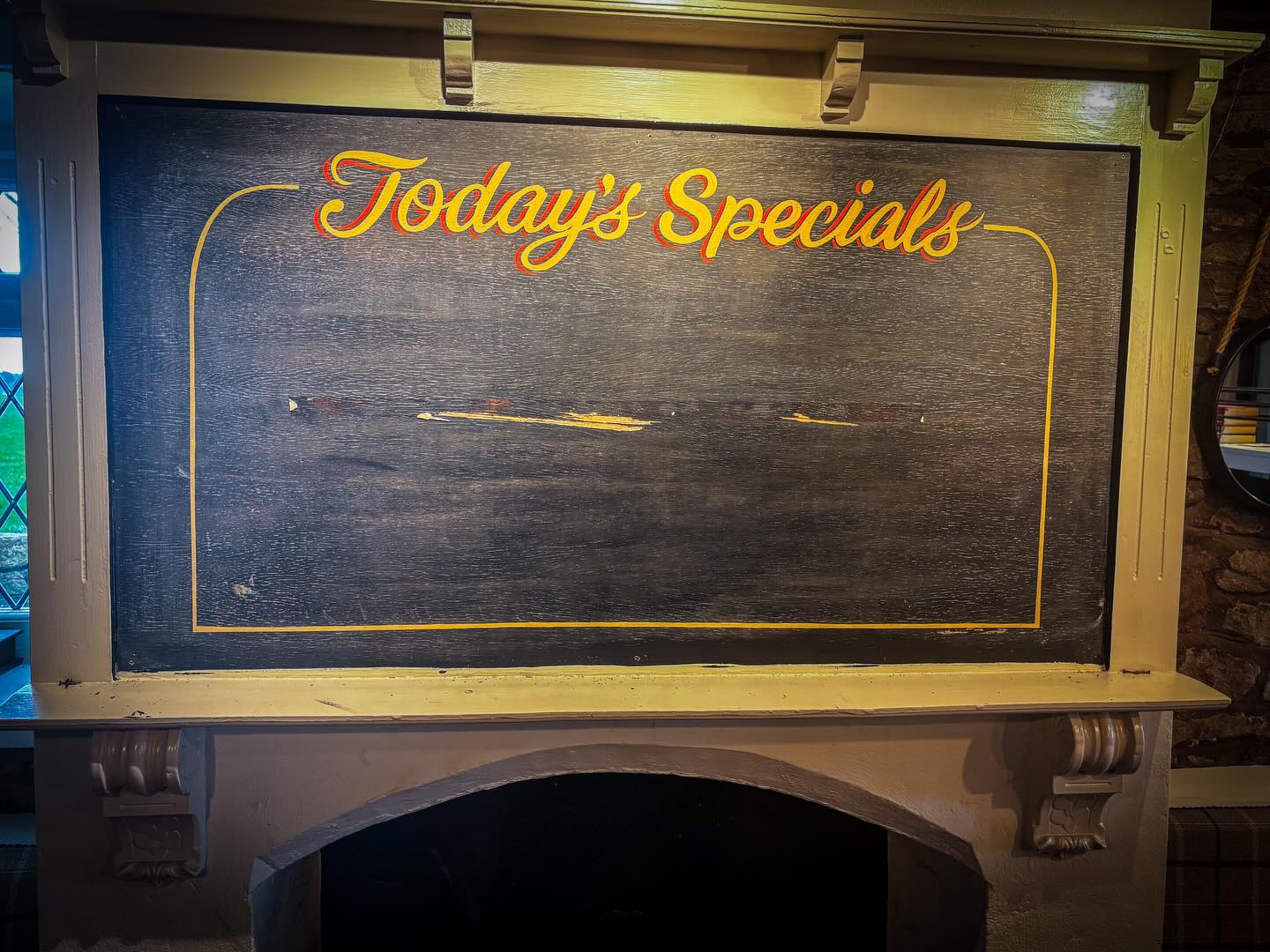 You may have noticed that our blackboard looked a bit worse for wear, so today we went to replace it and found this!
Does anyone remember this and know when/who was here when it looked like this!?