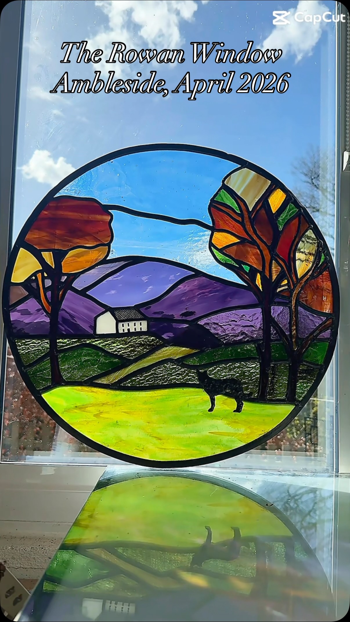 The Rowan Window, Ambleside April 2026
A incredibly special & personal 52cm diameter leaded porthole window, depicting the surrounding fells of Ambleside, and the house the window will be installed in, but before the rest of the town existed below, inspired by William Green pen and ink drawing from 1809.
The window also features a solder overlay silhouette of the beloved household dog Rowan, looking over to ‘home’ who sadly passed away a few weeks before the window was completed. As you can imagine, the reveal today was emotional for us all….
Created using a mix of @oceansideglass , @youghioghenyglass and stunning @englishantiqueglass from @creativeglassguild in Bristol. It was an absolute treat to be able to visit in person and hand select each sheet specifically for this project.
After taking the panel to site so we could all see how it looked in what will be its final setting, I then whisked it away on behalf of the clients to get it encapsulated into a double glazed unit at West Coast Glass in Morecambe. This should hopefully only take a few days, so I’m so looking forward to revisiting this wonderful newly built garden room in the next few weeks once their builders have fitted the unit into the frame 🥰
#GlassArt #GlassArtist #BespokeCommission #MemoriesThatNeverFade #lakedistrict
@edenvalleyartisticnetwork @cumbrialifemag @craftsmenatthepriory @rheged_centre @contemporaryglasssociety @thehappyherdwick @make_it_at_market @britboxtv @bbc @artinthepen @artsandcraftsinkeswick @arts_cumbria @visitambleside @gatherennerdale @visitkeswick @cookhousecrafts