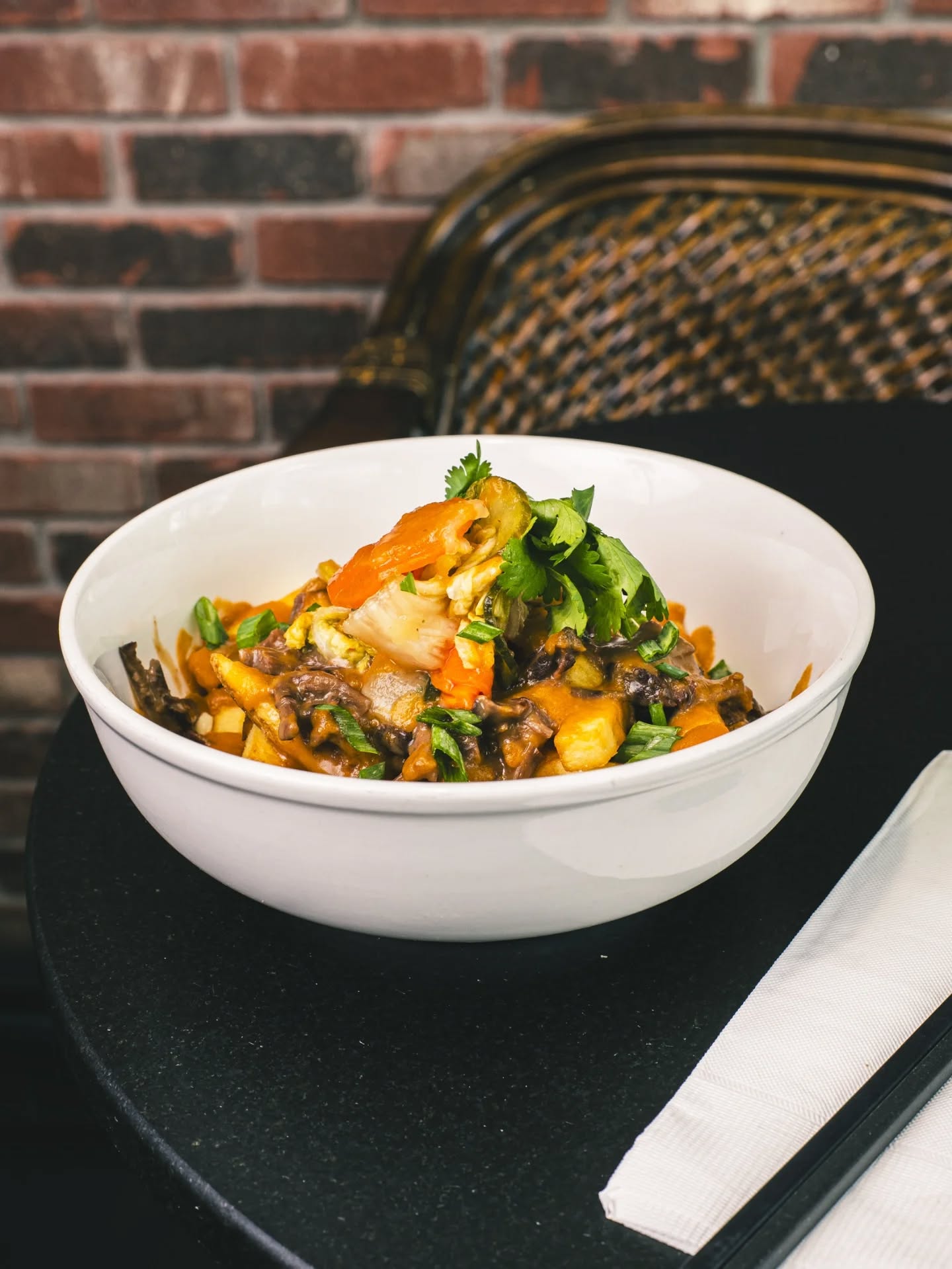 14 days of Poutine is BACK!
*VIET KIMCHI POUTINE* loaded with slow Braised Beef on crispy fries with Kimchi Gojuchang Beef Gravy, Cheese Curds & finished with in house made Kimchi, Cilantro & Scallions.
$15 and available until April 26th. Get it in ya (maybe even twice!)
#YumSon #VietModern #NelsonBC
_______________________________________________