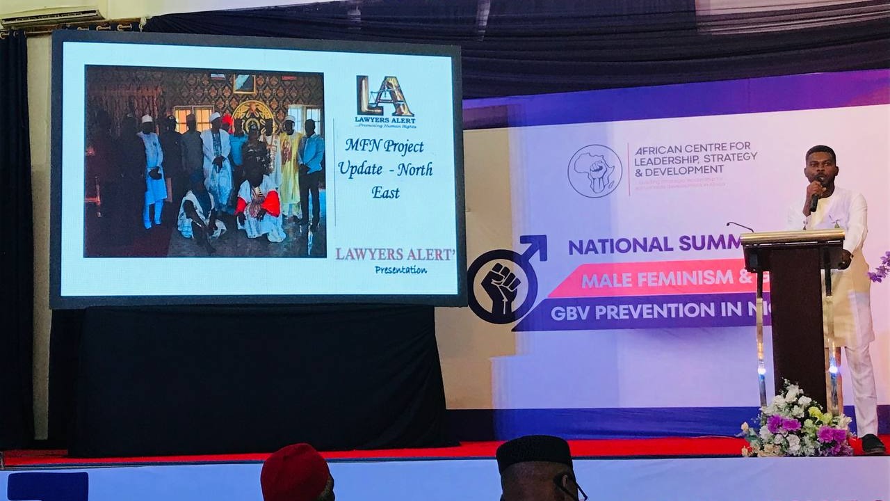 Lawyers Alert Highlights Training and Registration of Over 600 Male Feminists at GBV Prevention Summit
We spotlighted our work in advancing gender equality and preventing gender-based violence (GBV) during the Summit on Male Feminism and GBV Prevention in Nigeria, convened by the African Centre for Leadership, Strategy & Development.
At the summit, our organisation was represented by Program Officer, Elvis Torkuma, who delivered a comprehensive presentation on the organisation’s achievements under its Male Feminist Project in North-East Nigeria.
He highlighted key interventions across Bauchi, Borno, and Gombe States, including training of trainers, community sensitisation initiatives, strategic advocacy visits, and targeted media campaigns.
Our initiative has particularly focused on mobilising artisans and community influencers, equipping them to challenge harmful gender norms and promote positive behavioural change at the grassroots level. The summit underscored the critical role of collaboration and sustained male engagement in addressing gender-based violence in Nigeria.