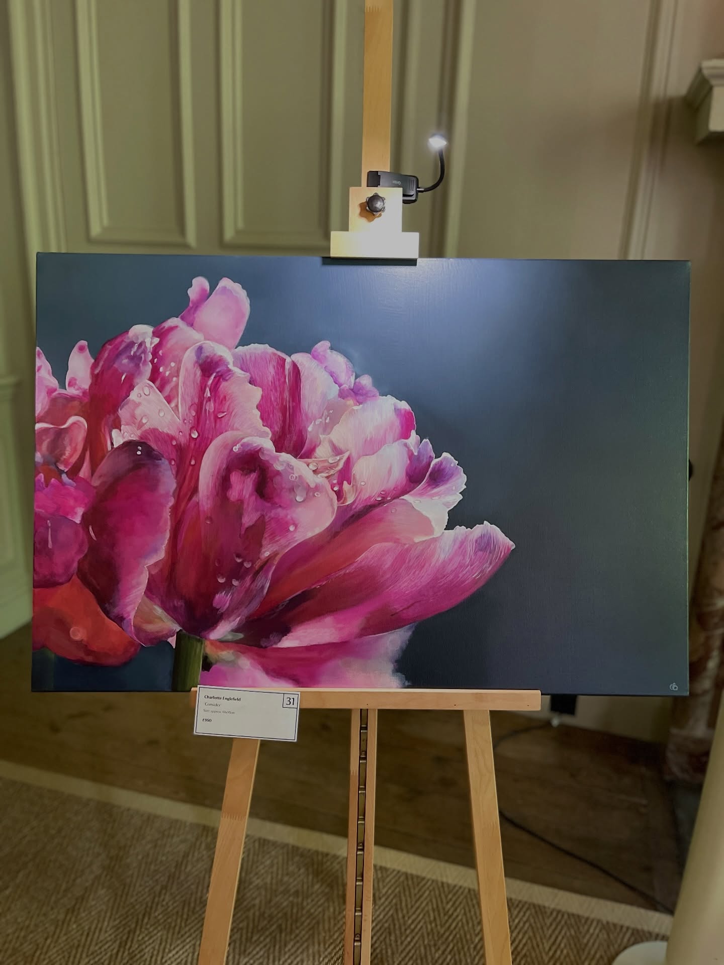 After spending several weeks painting this large acrylic tulip and photographing it as a work in progress, I somehow completely forgot to photograph the end result!
So while I was @ntdyrhampark today, I managed to quickly snap this shot. It’s something quite different for me and definitely a step away from my usual colour palette, but it’s been so lovely seeing it displayed in such a beautiful setting, surrounded by incredible art and stunning tulips.
This painting is for sale and part of the Tulipmania exhibition, which is on now until the 4th May 2026 at Dyrham Park, alongside artwork from @katebatesart @kathyhuttonprints @clareduguidart @clairehoughtontextiles @anniemeierart and @anniemeierart