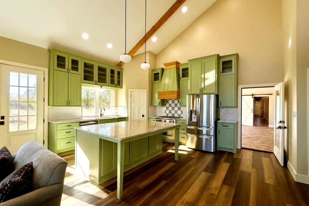 More than just a kitchen, this space is the home’s social anchor.
Open - airy - effortlessly social.
Seamless access to the breezeway for alfresco dining, and grand-scale windows framing the surrounding fields, bringing the landscape inside.
This barndominium truly delivers!