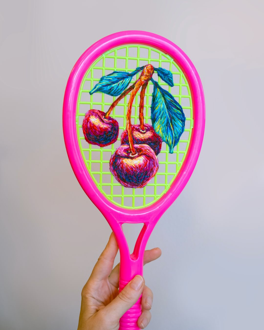 Well exsqueeze me, Ma Chérie 🍒💕
I found this small racket in my favourite colour combo, and I had to lean in with some deliciousness.
This cherry baby is going into the next racket update. *insert cheeky wink to newsletter subscribers* 🪡✨😉
#whataracket #embroidery #needlework #fibreart #upcycleart