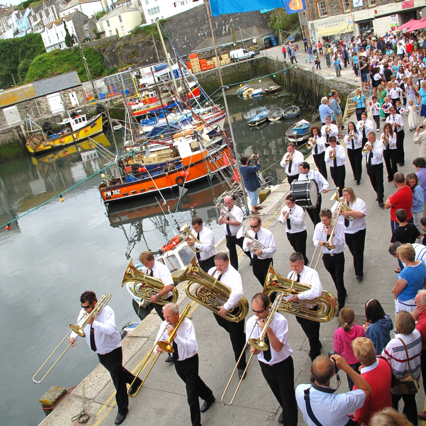 The Floral Dance features heavily throughout Feast Week... do you love the sound of the big bass drum?
Photo: George Taylor, 2010
"As I walked home on a summer's night,
When stars in heaven were shining bright
Far away from the footlights' glare
Into the sweet and scented air
Of a quaint old Cornish town
Borne from afar on the gentle breeze
Joining the murmur of summer seas
Distant tones of an old world dance
Played by a village band perchance,
On the calm air came floating down
I thought i could hear the curious tone
Of cornet, clarinet and big trombone,
Fiddle, cello, big bass drum,
Bassoon, flute and euphonium,
Far away as in a trance
I heard the sound of the floral dance."
#MevaFeastWeek
#FloralDance
#ThrowbackThursday