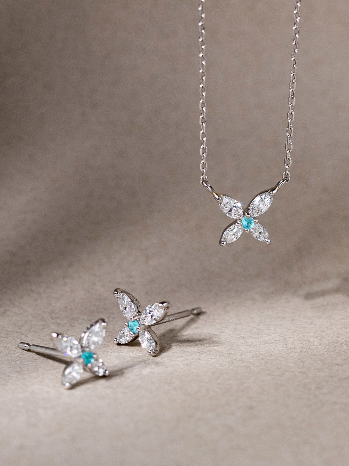Light as a whisper, the Butterfly Necklace with Paraiba Tourmaline captures a fleeting moment in flight.
Four marquise-cut diamonds form delicate wings, their graceful curves echoing nature in motion. At its heart, a vivid Paraiba Tourmaline adds a soft spark of colour — a quiet contrast against the brilliance of diamonds.
A symbol of transformation, freedom, and quiet strength.
Made for everyday elegance, or moments that mean a little more.
Visit our Ann Siang Hill Boutique to discover it in person.