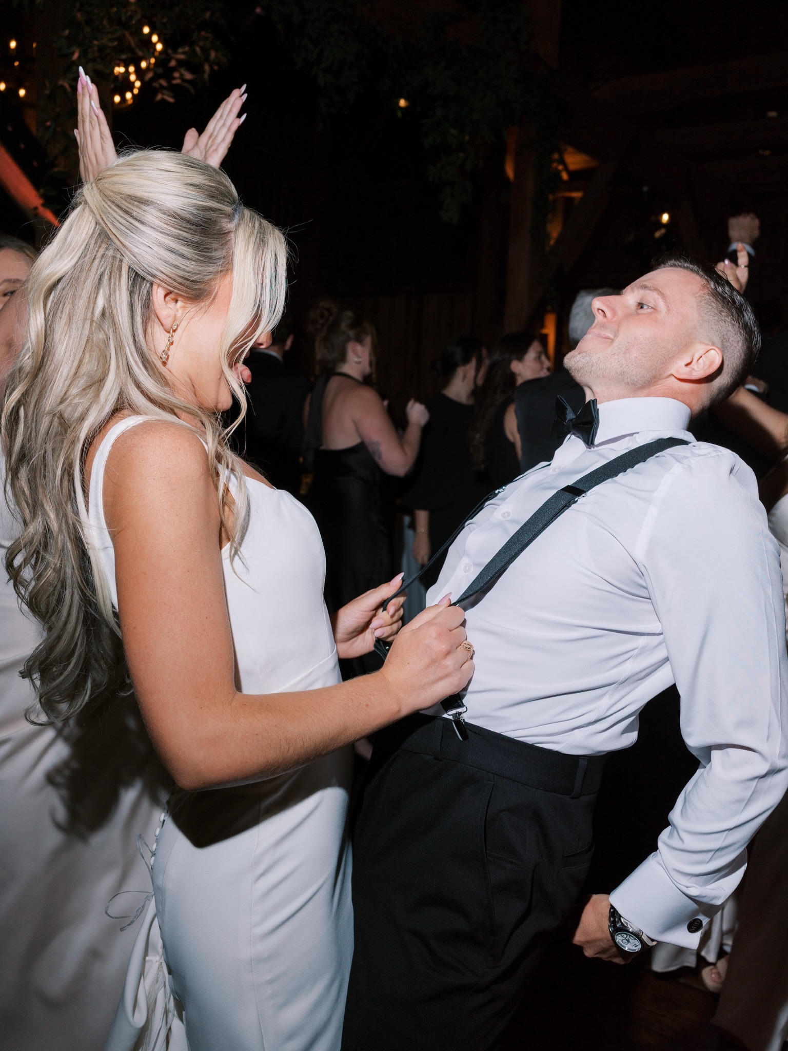 When the suspenders become a steering wheel! #3WESTweddings | 📸 @laurenblissassociates | venue: @thefarmateaglesridge