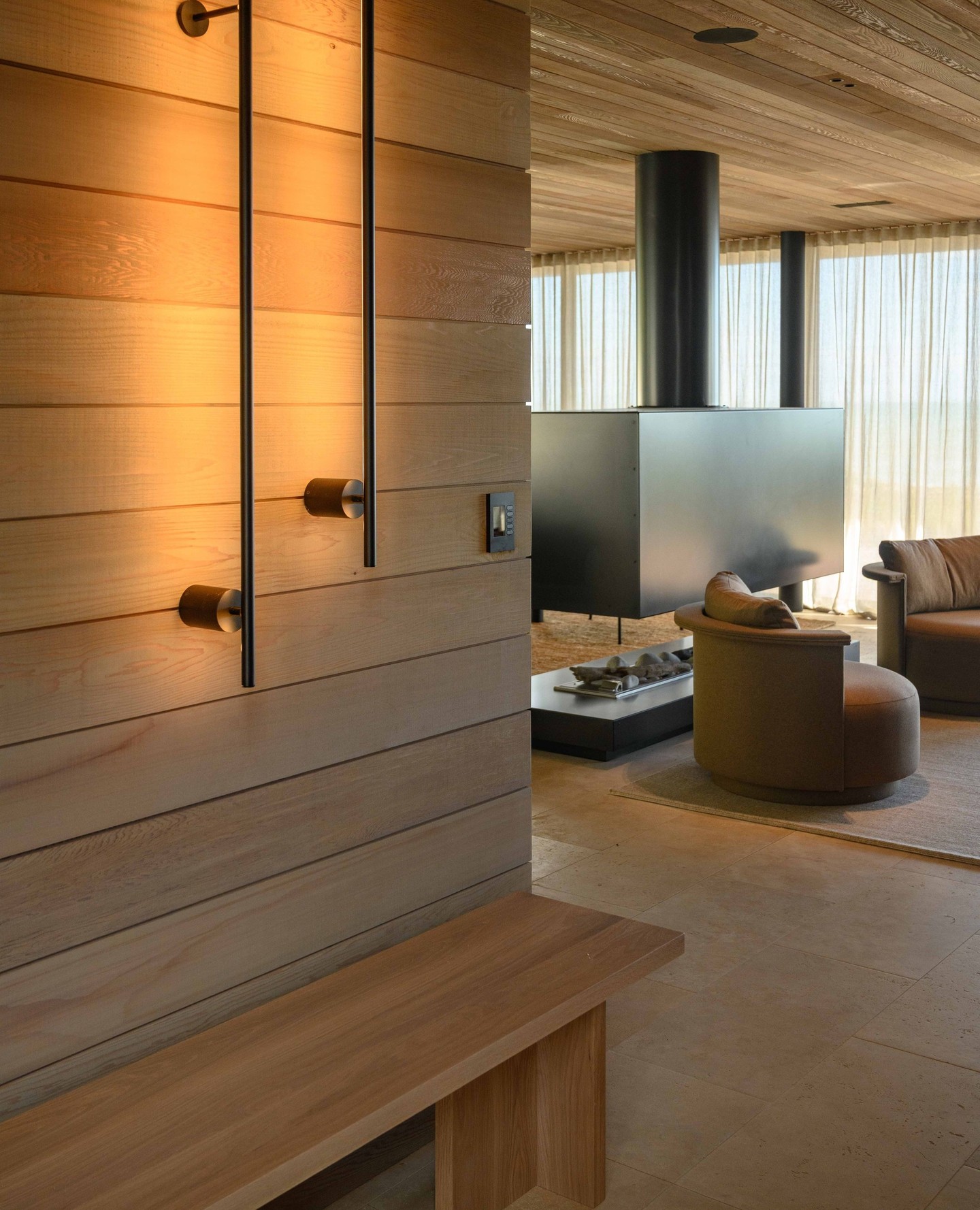 Hunkering down at the beach when it's wet outside. There’s a quiet discipline to this space — where every line is considered and every junction resolved. Natural timbers and stone set a calm, grounded palette for the interior with the cedar walls and ceilings align seamlessly, the detailing exacting yet never overworked.
It’s this level of craftsmanship that creates a sense of calm — orderly, refined, and deeply restful — with the suspended fireplace gently anchoring the room at its centre.
Builder: @calleyhomes
Architecture: @carnachan_architecture
Interiors: @shawdesign.nz
#CalleyHomes #ArchitecturalHomes #NZArchitecture #NZDesign #LuxuryHomesNZ
#Craftsmanship #BuiltWithCare #DetailDriven #DesignLed #RefinedLiving
#TimberInteriors #CedarCladding #NaturalMaterials #MaterialPalette #InteriorArchitecture
#CoastalLiving #BeachHouseDesign #WarmInteriors #ModernLiving #FireplaceDesign