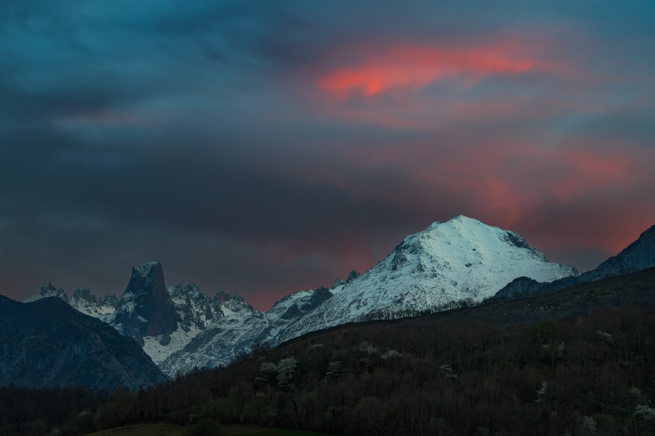 Wildfires and a crazy sunset.
During my latest trip along the wild coast of Asturias, it had always been a dream of mine to finally visit the Picos de Europa. Unfortunately, the weather had other plans, and most of the hikes I had in mind never happened. In the end, the only place I reached was a simple roadside viewpoint.
On the way up, I passed a wildfire. Smoke was drifting slowly toward the mountains, and when I arrived, the scene felt flat and lifeless. For a moment, it seemed like one of those days where nothing really comes together.
But I stayed.
As the evening unfolded, the atmosphere began to change. The smoke started to clear, light broke through, and suddenly the mountains came alive. Warm tones touched the peaks, and the sky turned into something I hadn’t expected at all.
A reminder that sometimes it’s worth waiting, even when everything tells you otherwise.
Shot on Sony A7 RV + Sigma 70-200mm f/2.8 DG + Maven Filters ND3 Dark CPL + framed on Gitzo Systematic Tripod.