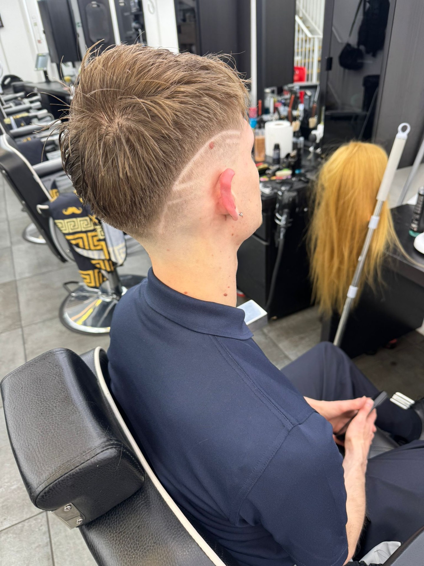 Clean taper fade with a razor lineโexactly what a proper short cut should look like. We keep it sharp, no fuss, just solid work every time. #taperfade #mensgrooming #guildfordbarber #surreybarbers #epicbarbers