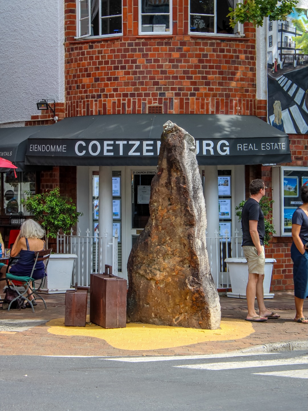 ACCIDENTAL TOURIST by Strijdom van der Merwe - @strijdomvandermerwe
2012 | Rock & Corten steel | Corner of Church Street & Andringa Street (Next to @Romeinabite Restaurant)
In this sculpture, nature takes on the unfamiliar role of a tourist on a visit to Stellenbosch. He has come to see what we have done and accidentally finds himself lost on a street corner in this new world created by man. If we continue to distance ourselves from nature, the artist believes we are in danger of losing our sense of balance and belonging.
Learn more → sost.co.za/artwork/accidental-tourist
Dreamscapes - Form and space through curious eyes curated by Dr Mike Mavura @mikemavura_ | 26 February 2026 – 30 January 2027
Presented by the Stellenbosch Outdoor Sculpture Trust, @visitstellenbosch, and proud patron, Private Clients by Old Mutual.
#SOST #Dreamscapes #Stellenbosch #StrijdomVanDerMerwe #WealthCurated
