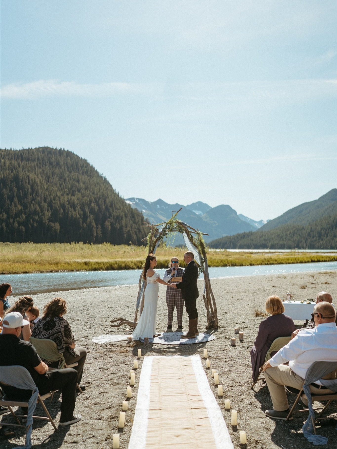 The morning of Colette & Peter’s Cordova wedding, the ocean was still. Radiant morning light and quiet that demands you stop and notice.
They kicked off their Alaska wedding weekend with a glacier hike with close family. We then found the perfect spot along the creek bed after a last-minute pivot (campers were set up too close to our first choice). It worked out for the better. They set up their arbor right there, with the water and mountains behind them; it was stunning.
The next morning, Colette got ready with her close crew. Quiet moments. Finishing touches. A ceremony that felt unhurried and fully theirs.
Their reception opened with a live bagpiper entrance. There was dancing, emotional toasts, quality time with loved ones, fireworks over the marina, and a last dance with no one rushing them out the door.
If you’re planning an intimate wedding or elopement anywhere in Alaska, or somewhere else entirely, I’d love to hear about it. 📷
~Dress and jewelry~ @arcticrosebridalak
~Alterations~ @bella_n_beyond907
~Custom hand-fasting cord~ @knotcrazyy
~Cakes~ Diana Ujioka
~Hair Stylist~ Tiffany Aiton
~Hair colored by~ @seaside.salon.cdv
~Eyebrows~ @ritualestheticscordova
~Bagpipes~ Ron Wallace
~Reception location~ @reluctantfisherman