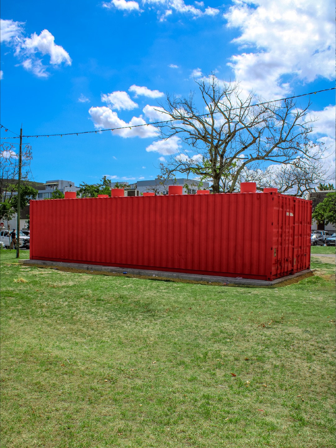 BUILDING BLOCK by @sost.stellenboschoutdoor
2026 | Paint and recycled oil drums | Die Braak, Stellenbosch
At first glance, this oversized Lego-inspired block looks like something from a child’s imagination — playful, colourful, and full of possibility. It invites curiosity, touch, and delight. But beneath its bright exterior lies something far more serious: a working borehole system, installed to help Stellenbosch effectively manage its water future. This artwork celebrates the power of creativity to transform how we see essential infrastructure. By turning a utilitarian container into a monumental toy, the piece reminds us that the building blocks of a town are not only pipes, pumps, and plans, but also imagination, cooperation, and care for one another.
Learn more → sost.co.za/artwork/building-block
Dreamscapes - Form and space through curious eyes curated by Dr Mike Mavura @mikemavura_ | 26 February 2026 – 30 January 2027
Presented by the Stellenbosch Outdoor Sculpture Trust, @visitstellenboschnow, and proud patron, Private Clients by Old Mutual.
#SOST #Dreamscapes #Stellenbosch #WealthCurated #VisitStellenbosch