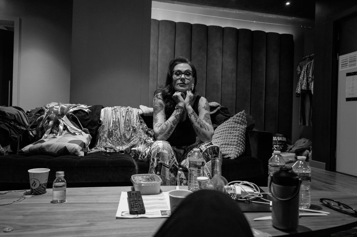 Some photos tell you something about yourself before you're ready to hear it.
ā
I've been going back through the images from The BIG Festoon and this is the one that stops my scroll each time.
ā
Backstage.
The dressing room after the arena had emptied out.
ā
Costume slung over the sofa.
Sequins catching what was left of the light.
Water bottles, half-drunk coffee, the running order, finally complete, on the table.
ā
The aftermath of the event that took everything I had to give.
ā
And me in the middle of it.
Chin resting on my hands.
Not performing.
Just sitting with it.
ā
I've been sitting like this for weeks now.
ā
Not stuck. Not lost. Not in pieces.
Just still.
Listening.
Letting the noise drop until I could hear what was actually mine to do next.
ā
The bit nobody photographs.
The pause between who you were and who you're becoming.
The version of you that stops pushing long enough to actually choose.
ā
I've never been more serious about this era of my life.
ā
Joyful still? Obviously.
But never more grounded.
Never more focused.
Never more clear.
Never more supported.
ā
I think I finally believe success is safe for me.
ā
Not just for the people I coach into their own success.
Not just for the friends, the clients, the rooms full of people I've spent years cheering and supporting into theirs.
ā
For me.
ā
That's the bit that took the longest.
ā
I could hold the door open for everyone else and mean Every. Word.
I just couldn't quite trust the room on the other side was meant for me too.
ā
Turns out it is.
ā
And I'm ready now.
Not in the old way.
Not braced. Not breathless.
ā
Ready in this way.
Sat on the edge of the sofa.
Boots on.
Eyes up.
Ready for the level where it get's the kind of good most can only dream about, because I know in my bones what's next.
ā
Different chapter.
Same heart.
Steadier hands.
šøShout out to the talented @alextoftphotography for capturing the parts of the story I really want to tell.