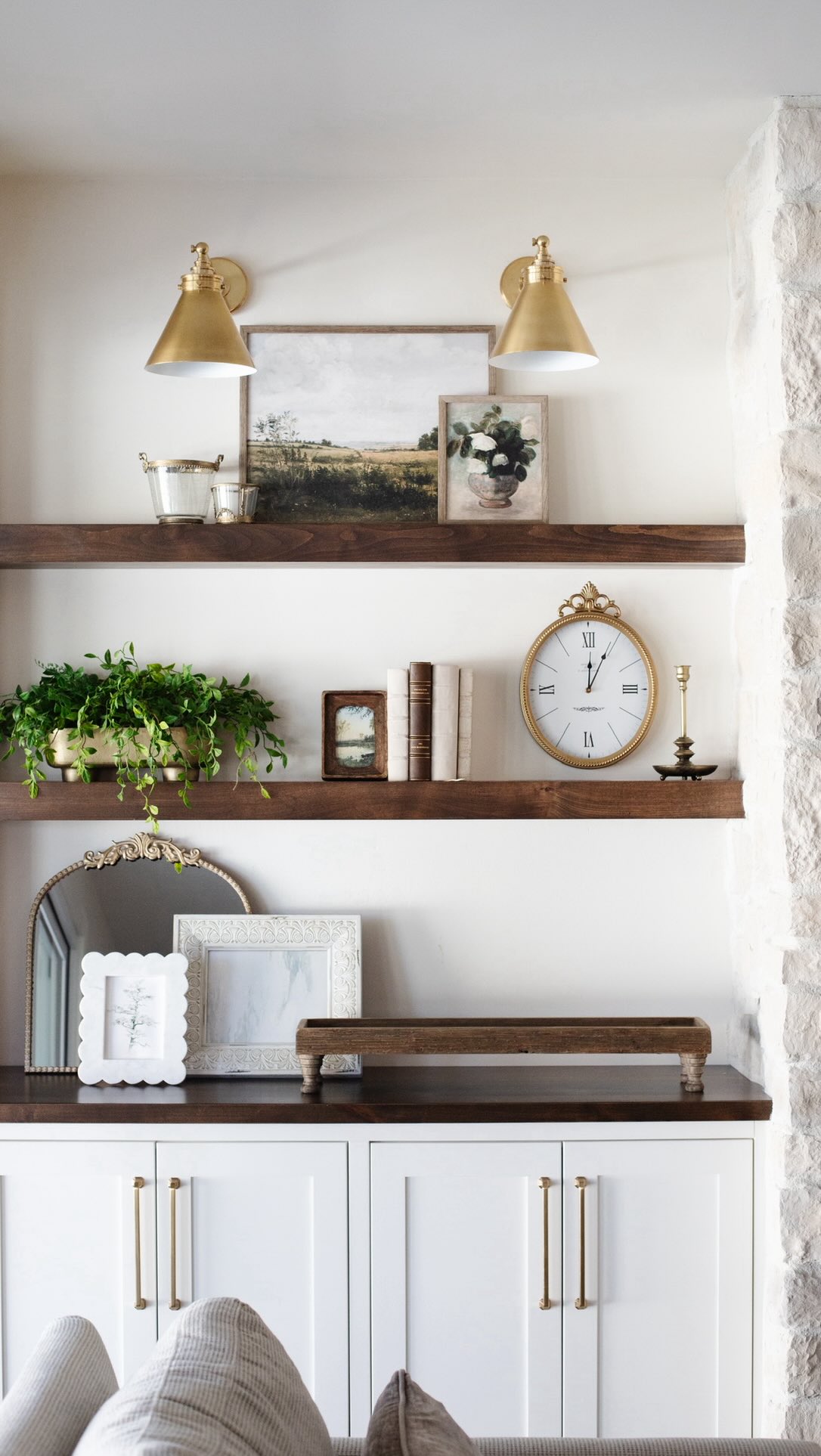 We absolutely love how these vintage-inspired shelves came together!
We went with slim, narrow shelving to keep the space feeling open and airy, and the end result feels effortlessly elevated. From the aged artwork to the gold mirror and vintage clock, and just the right touch of greenery, every detail was thoughtfully layered for that timeless, curated look.
Have your furniture but still feel like something’s missing? Our Accessory Package is the perfect finishing touch. 🌿 It includes:
✨ A 30-minute in-home consult
✨ A 30-minute in-store discovery visit
✨ A 3-hour in-home install where our designers bring curated accessories—like art, greenery, accent pieces, and lighting—to complete your space.
We’ll bring plenty of options and style everything so it feels personal, polished, and just right for your home.
Click the link in our bio or comment DESIGN to book a call with our lead designers, let’s bring your space to life!
What’s your go-to accessory that makes a room feel finished? Tell us in the comments! 💫
.
.
.
#DesignerBlvdStyling #InteriorStylingInspo #AccessoryPackage #VintageInspired InteriorStylistAZ HomeStylistTips StylishLivingAZ DesignerStylingSolutions InteriorDesign HomeDecor HomeStyling HomeDesign InteriorDesignerAZ StylingExpertTips ElevatedDesign TimelessStyle InteriorInspo
