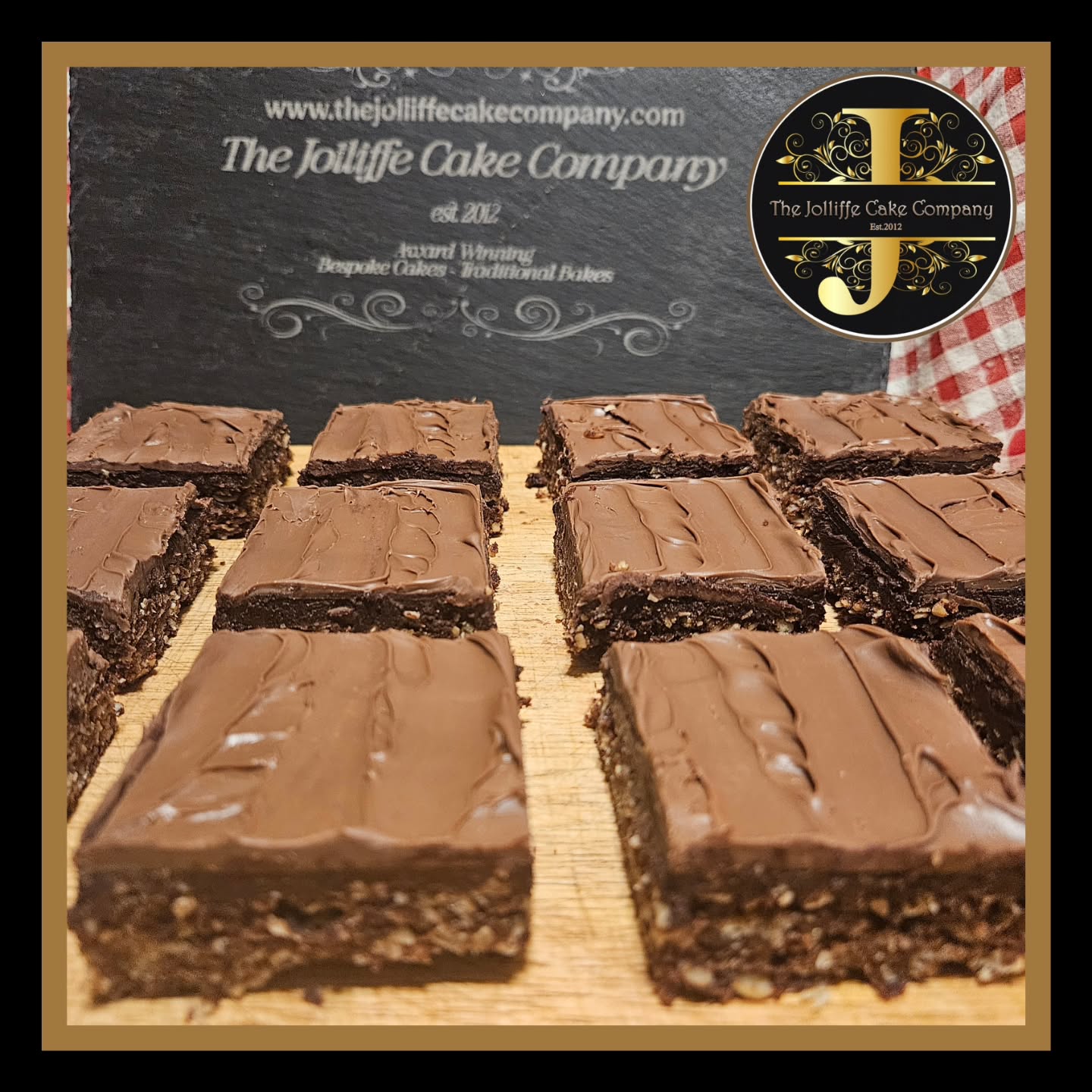 Chocolate Oat Squares/Oaties. Always popular and a retro school dinner bake! Box of 12 squares, available to order via our website to anywhere in the UK. A baked oaty, chocolatey base, with a rich chocolate buttery layer and topped with Milk chocolate. #chocolateoaties #chocolateoatsquares #thejolliffecakecompany #ukdelivery #ukberkshire