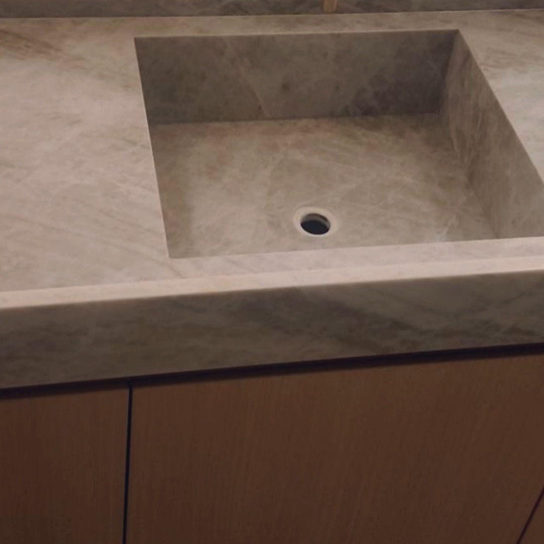 Handcrafted integrated sinks are a stunning addition to any kitchen or bathroom, offering a seamless and sophisticated look. These sinks are typically made from materials such as marble, quartz, porcelain, quartzite, or solid surface, allowing for a smooth, uninterrupted flow from the countertop to the sink basin. This design not only enhances the aesthetic appeal but also simplifies cleaning, as there are no seams or crevices where dirt can accumulate. Artisans who specialize in creating these sinks often take great care to ensure that each piece is unique, reflecting the natural beauty of the materials used. The craftsmanship involved in this creation means that homeowners can enjoy a functional yet artistic centerpiece that elevates the overall design of their space. These creations means that homeowners can enjoy a functional yet artistic centerpiece that elevates the overall design of their space.