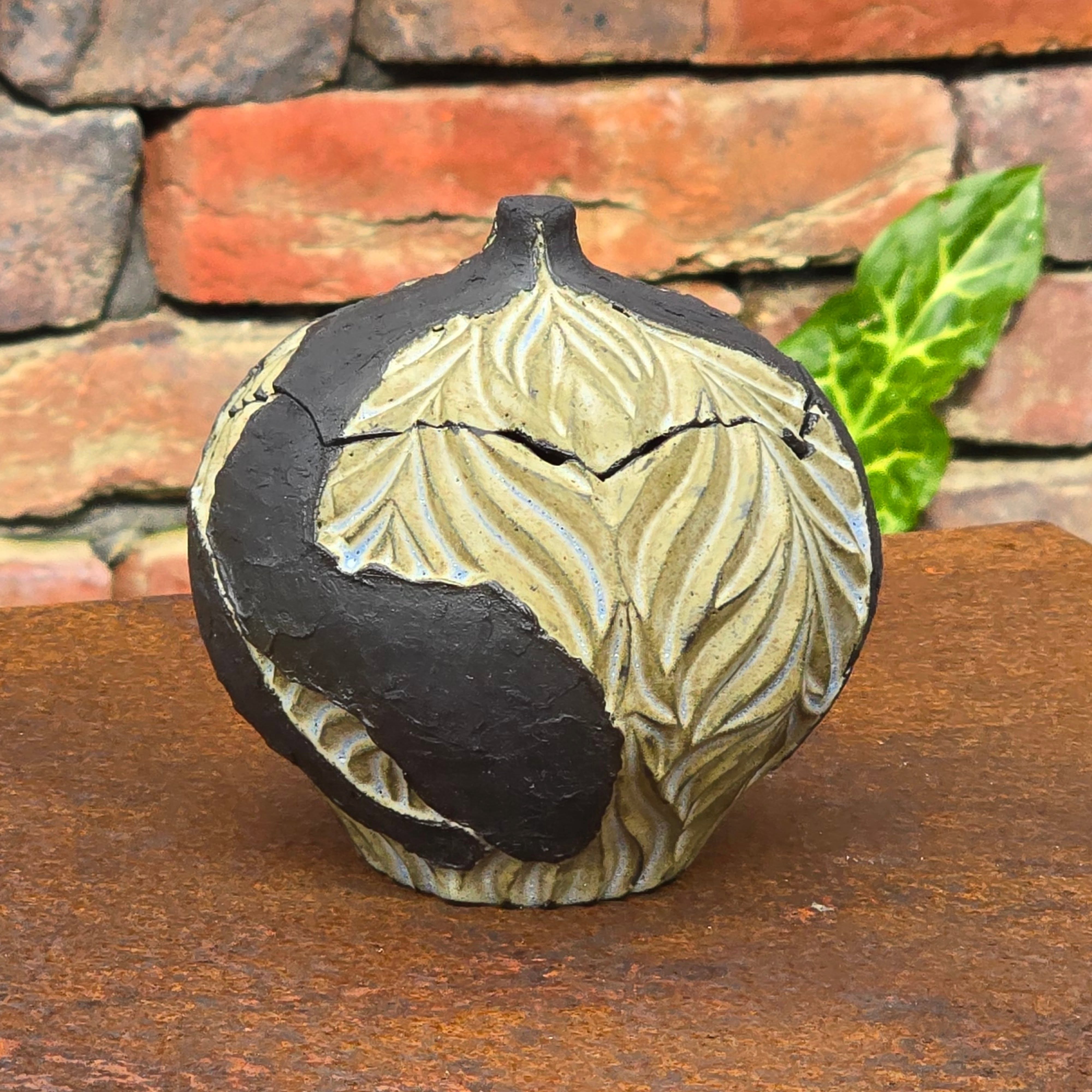 I really love the contrast of this glaze with the black clay.
Another small carved part urn.
#diamondcoretools