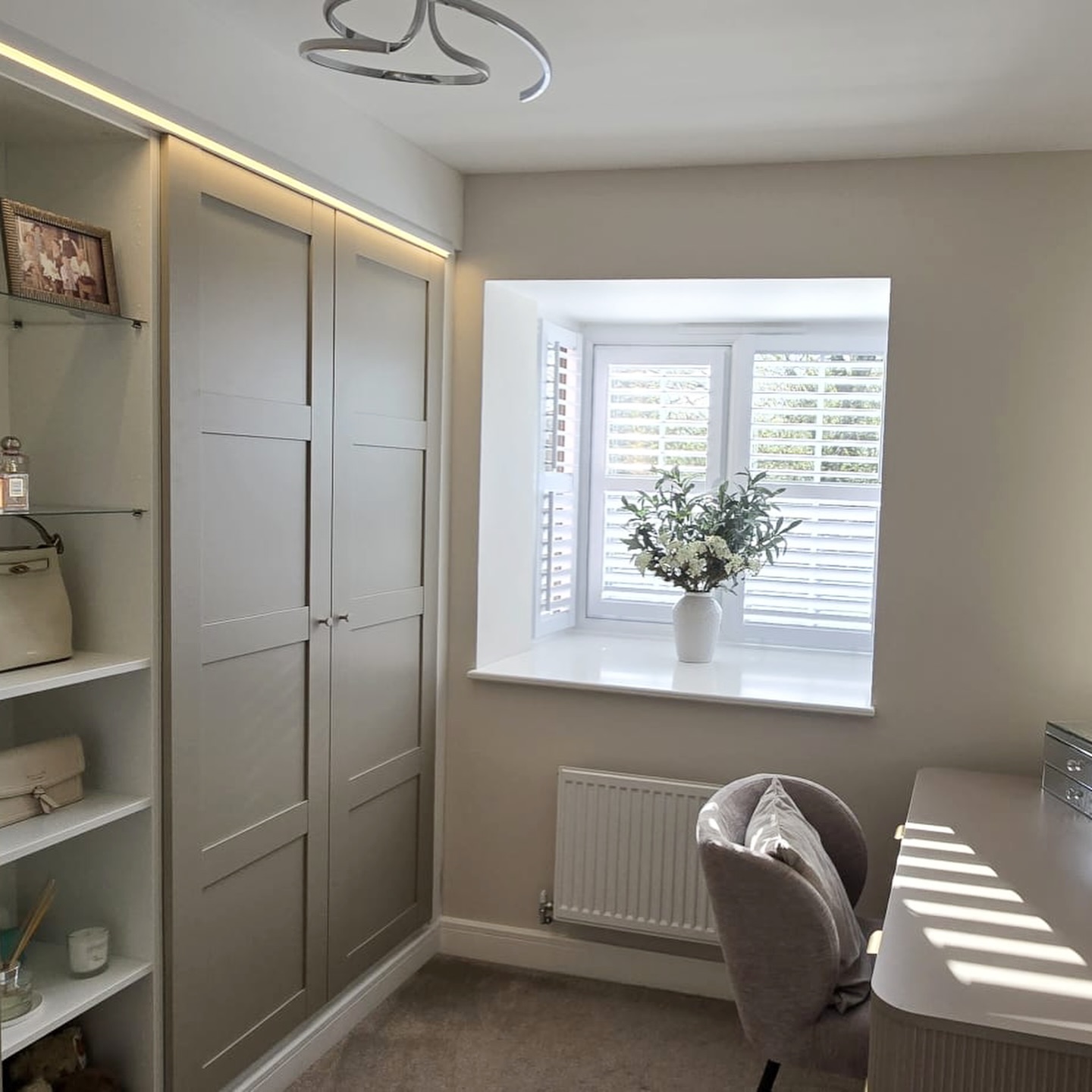 A full bedroom transformation completed in Shavington ✨
We designed and fitted these bespoke shaker fitted wardrobes in the timeless Farrow & Ball Elephant’s Breath shade, creating a clean and luxurious look with practical storage throughout. Finished with a custom LED pelmet lighting feature above the doors for a warm ambient glow that adds a real high-end touch.
The matching built-in dressing table area features fluted wall panelling, a statement half-moon backlit mirror, and sleek contemporary curves to bring elegance and sophistication to the room. A perfect blend of style, storage, and premium craftsmanship.
If you’re looking for fitted wardrobes in Shavington, Nantwich or Cheshire, we design, build and install fully bespoke bedroom furniture tailored to your space.
@rsmhomeimprovements @eagles_electrics_ltd
🌐 www.rsmhome.co.uk
#FittedWardrobes #Shavington #Nantwich #CheshireInteriors #BespokeFurniture
