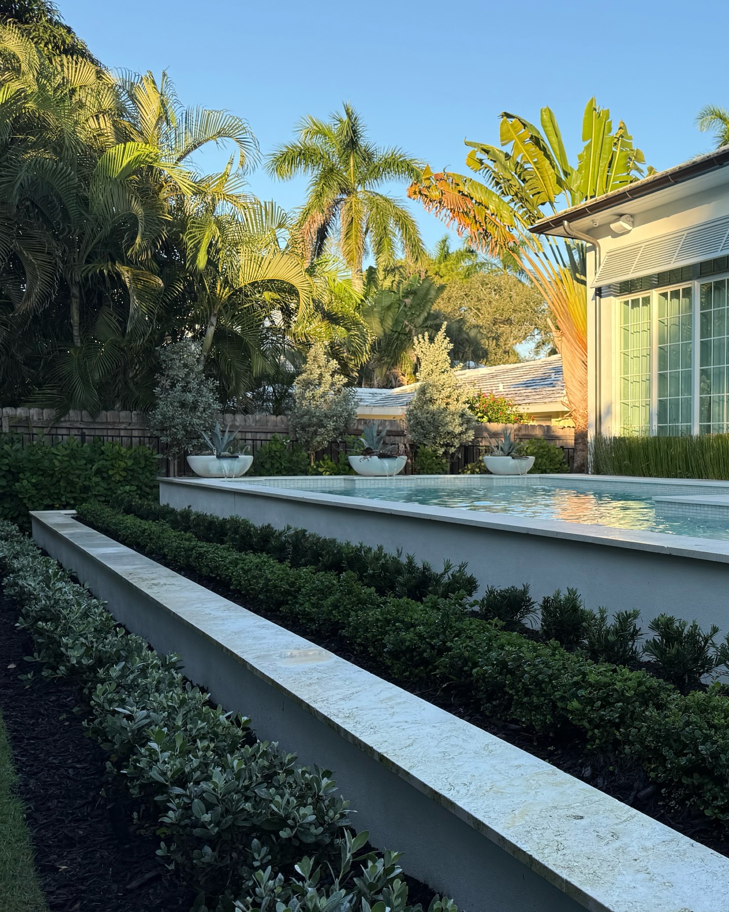 Framed in light, layered in detail, and designed for the way private outdoor living should feel. This Moorings residence balances clean architectural lines with softened tropical planting, reflective water, and intimate moments of retreat at every turn. In Naples, luxury is often quiet. It lives in proportion, materiality, and the ease of stepping outside to something extraordinary.
#MooringsNaples #NaplesLandscapeDesign #LuxuryOutdoorLiving #PrivateResidenceDesign #FloridaLiving