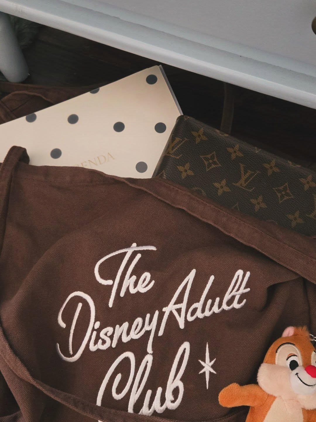 The Disney tote you didn't know you needed. I use this bag every single day. It has become a fun way to style my work look and celebrate this anthem. Lightweight, super roomy, and just the right ratio for shoulder to body. 🐿️🤎
#DisneyAdultsDoExist #DisneyFashionista #DisneyOotd #DisneyBoundingStyle #DisneyMerchandise