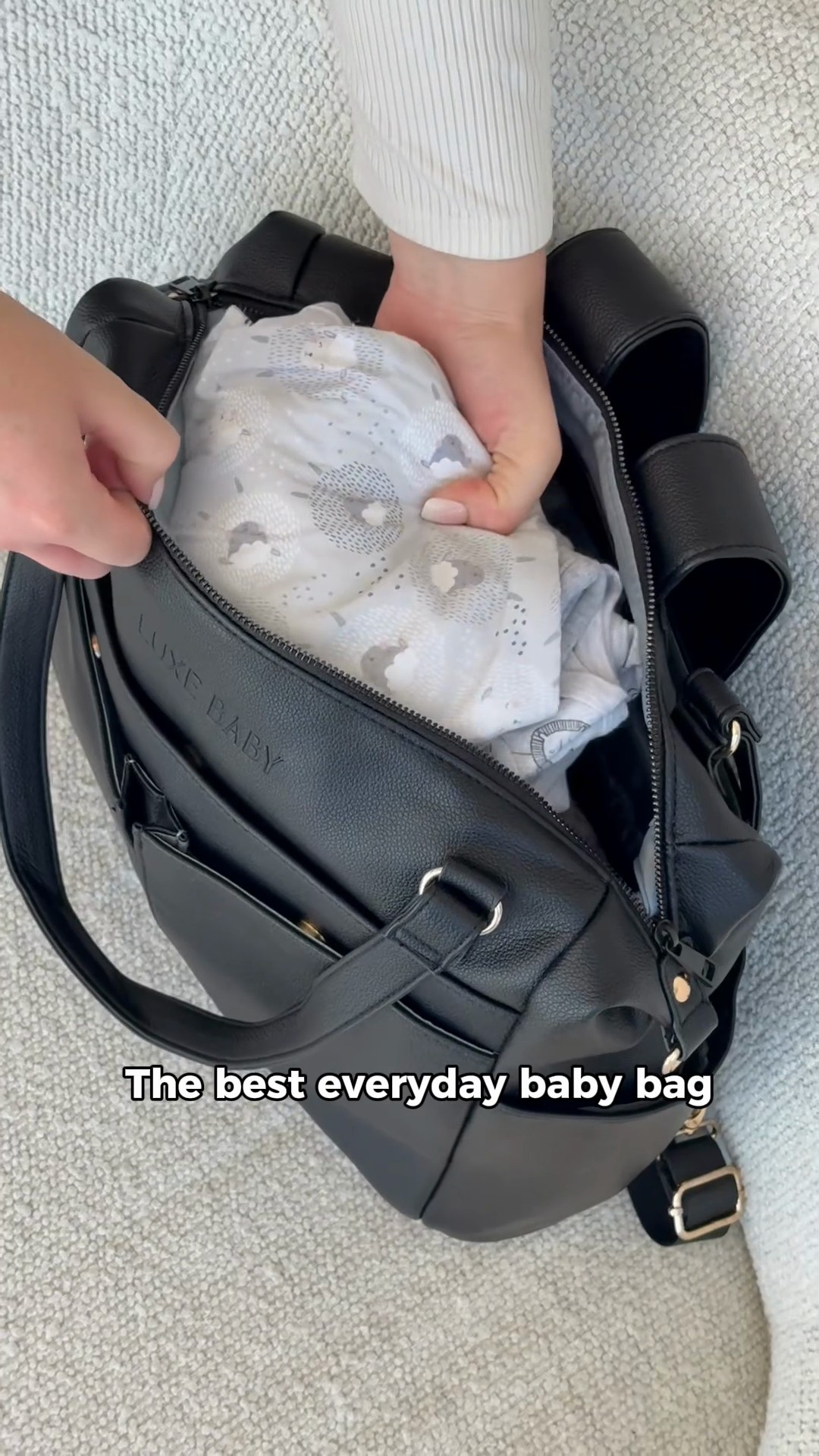 The bag that somehow handles the baby stuff, your stuff, and the random extras you swore you weren’t bringing 🤝