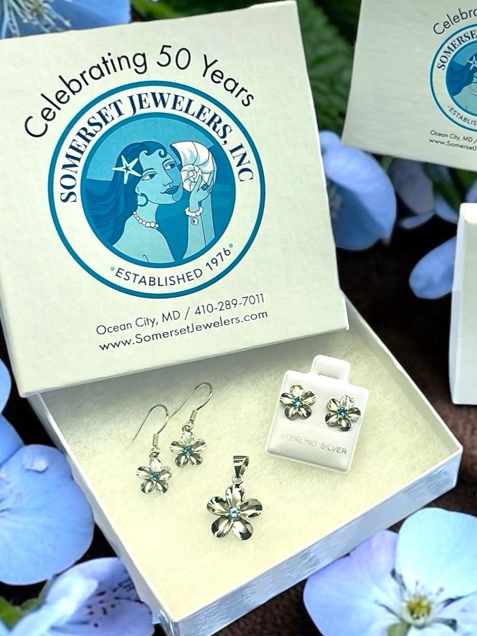 Springfest Specials are here 🌼
Add a touch of spring with our delicate flower set in sterling silver, featuring a genuine blue topaz stone that catches the light just right.
Join us May 8 from 4–7 as we celebrate 50 years of sparkle, style, and community.
#SpringVibes #SomersetJewelers #TopazGlow #JewelryStyle #SeasonalSparkle #ClassicElegance #ShopLocal #50YearAnniversary #SpringAccessories #AnniversaryCelebration #sterlingsilver #sterlingsilverjewelry