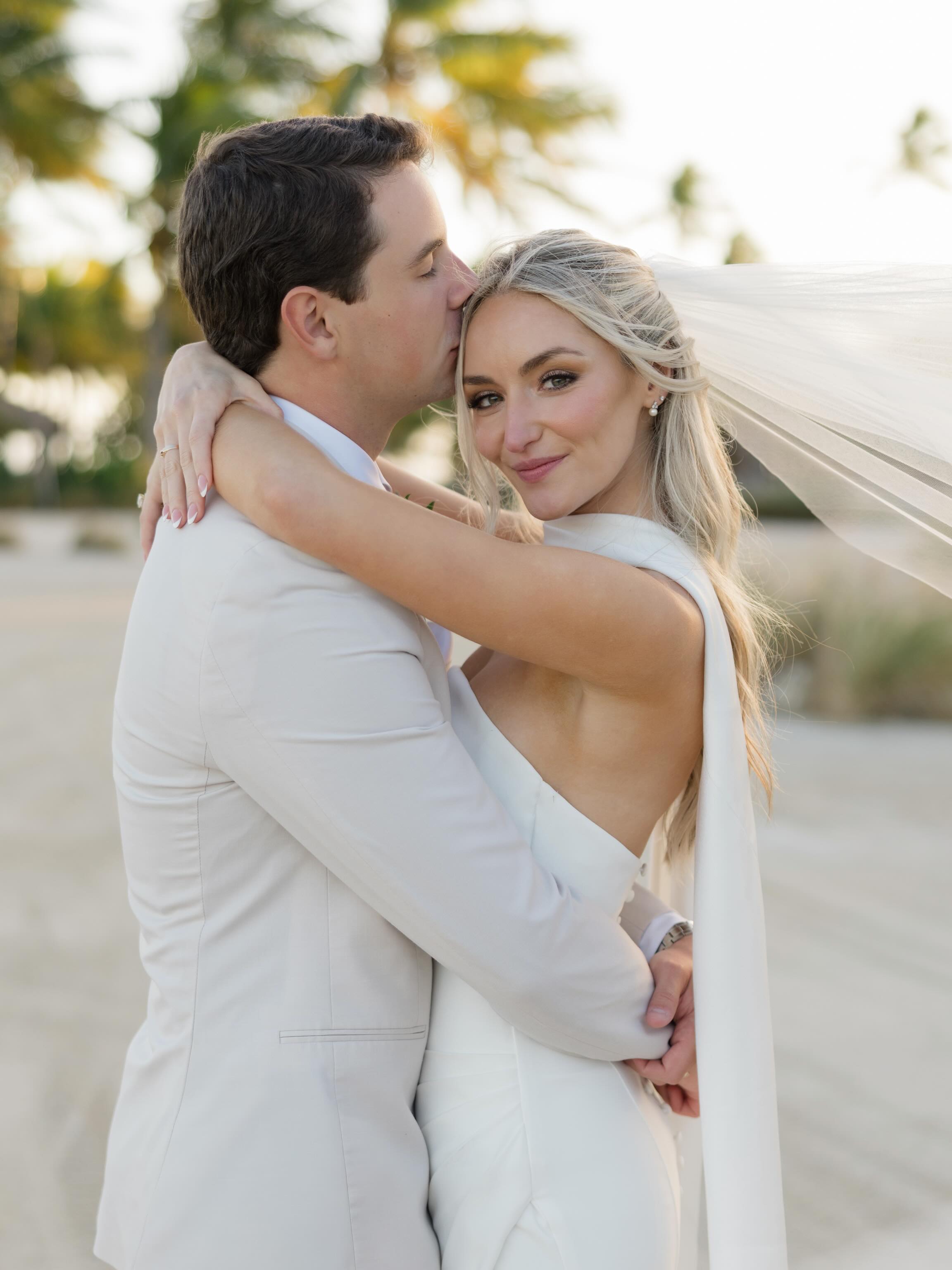 the kind of love that arrives right on time and makes forever look effortless ✨🤍
our bride Kaitlyn wore the timeless conti gown by @annebarge paired with a chic satin scarf and a lace veil for her upscale island wedding! their love is contagious even through these photos 🫶🏼
gown | @annebarge
photo | @graceannraephotos
venue | @islanderresort
video | @createdfour
•
•
•
#floridawedding #realbride #calvetbride #annebargebride