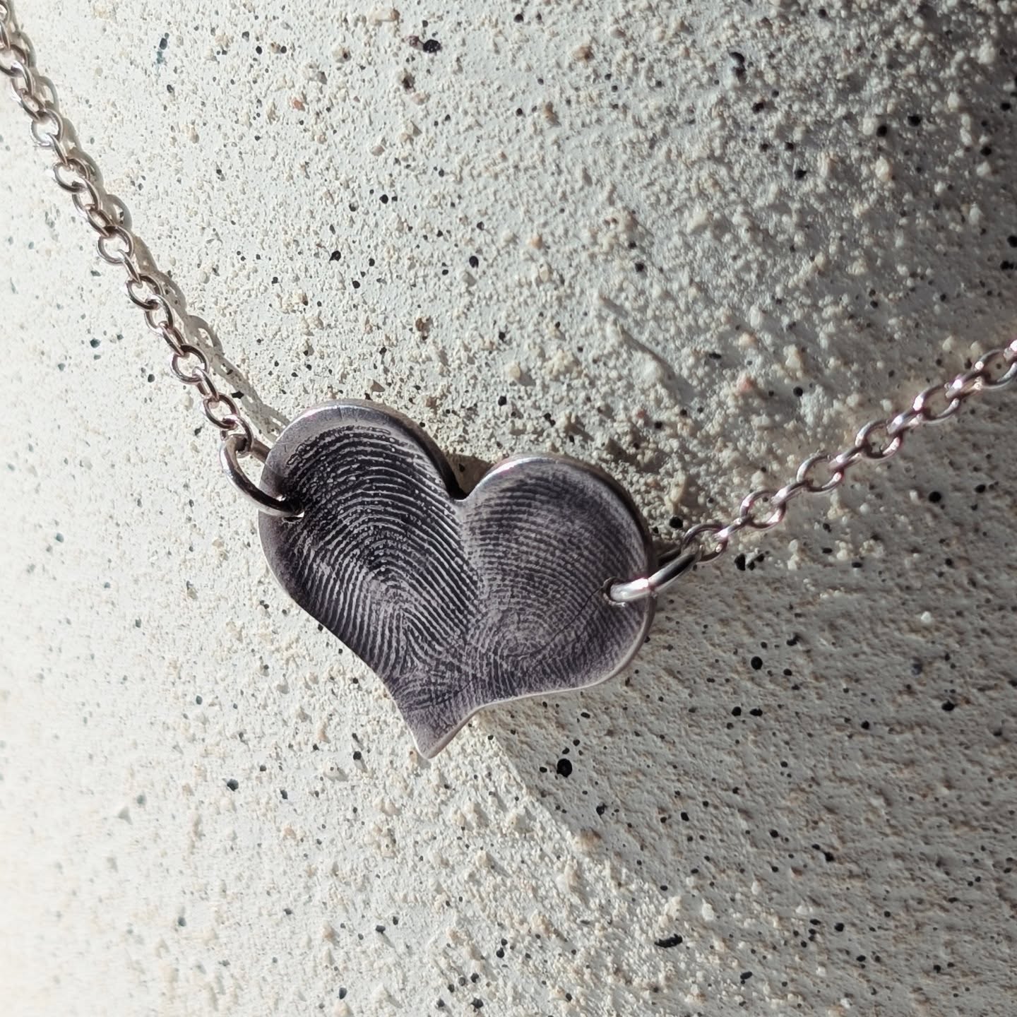 🖤 Two souls, one story 🖤
This handcrafted silver necklace captures the beauty of connection with two real fingerprints, forever intertwined. A piece that holds meaning, memory, and love in its most personal form.
Fingerprint jewellery is as unique as you are, perfect for celebrating love, family, or a moment you never want to forget.
Every detail is carefully made by hand, turning something as unique as a fingerprint into a timeless keepsake you can wear close to your heart.
Find this design and many others (all that can be tailored) on our website. 🥰
#handmadejewellery #fingerprintjewellery #meaningfuljewellery #keepsakejewellery #smallbusinessuk